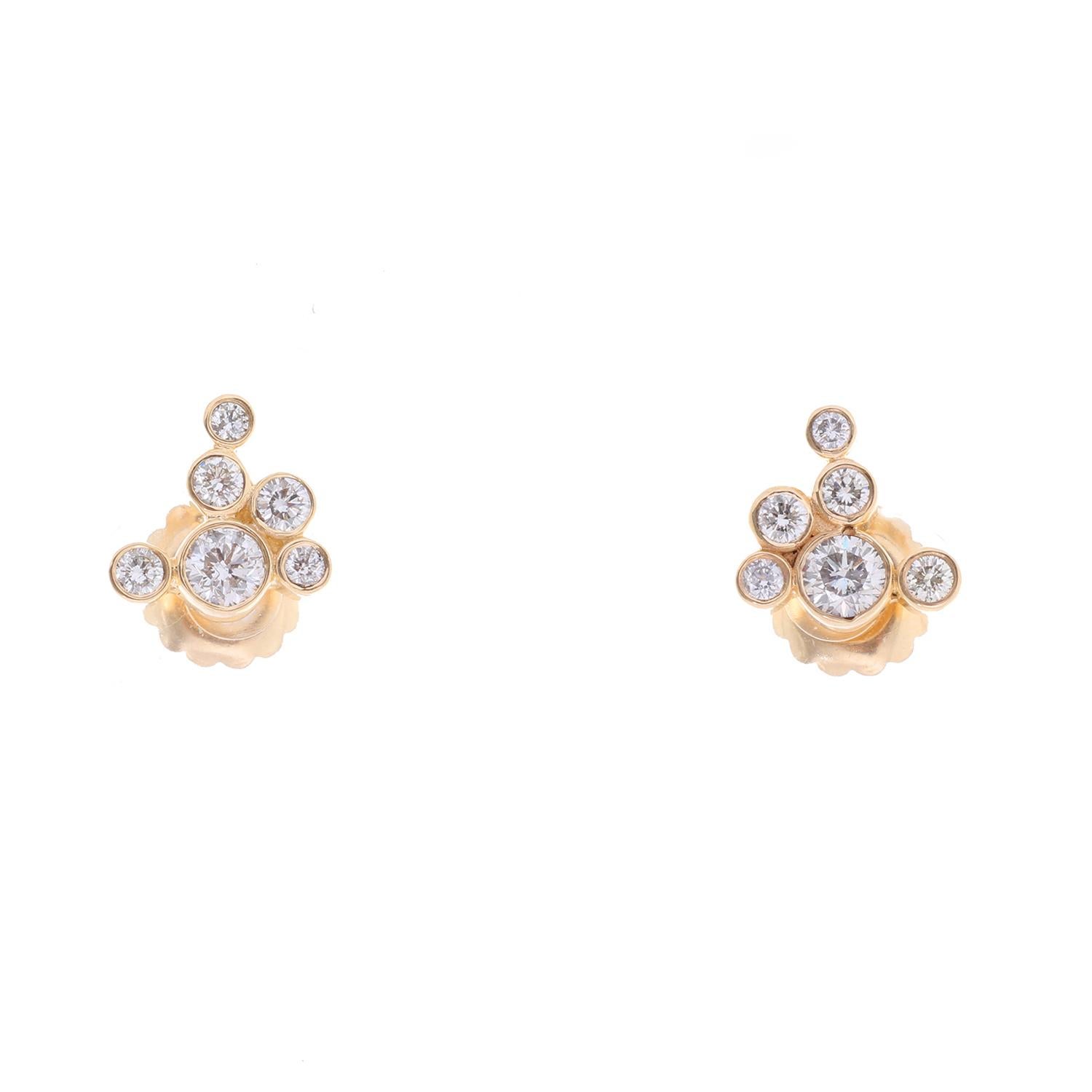 14K Yellow Gold Cluster Diamond Earrings - . Dressed up or Dressed down these cluster earrings measure 1.60 cts sitting on 14K Yellow gold. Diamond Color GH. Clarity SI. Total weight 5.8 grams..