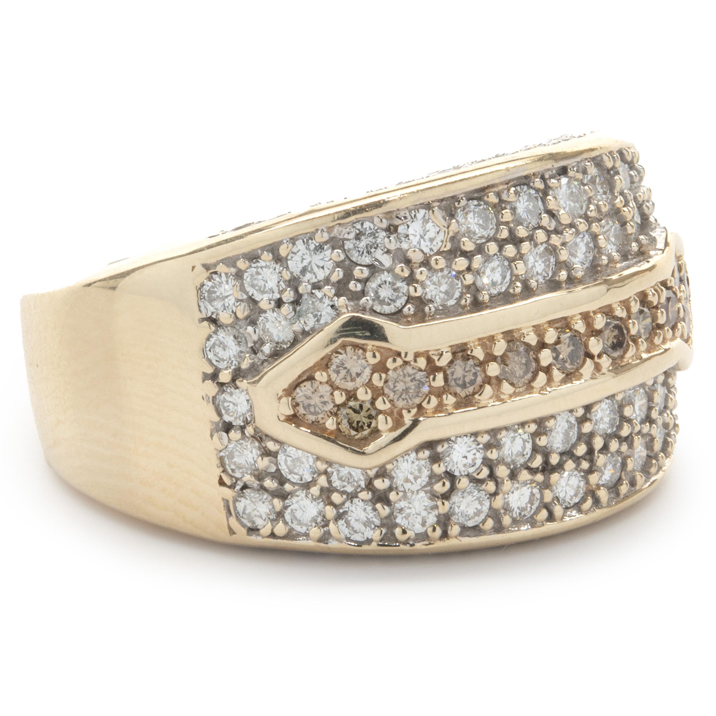 Designer: custom design
Material: 14K yellow gold
Diamonds: round brilliant cut = 1.34cttw
Color: H / Champagne
Clarity: SI1
Dimensions: ring top measures 13mm wide
Weight: 10.58 grams