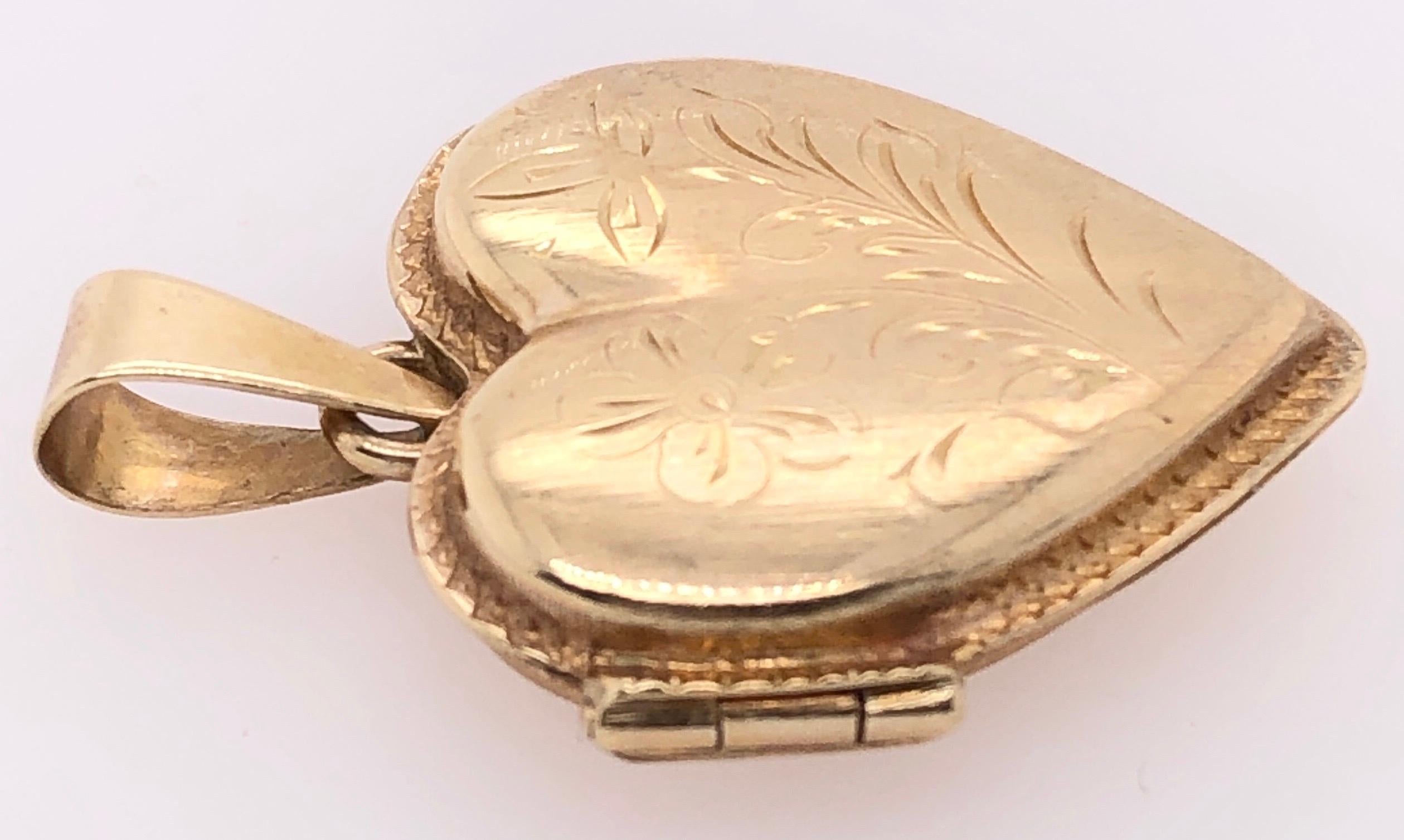 14 karat gold heart locket