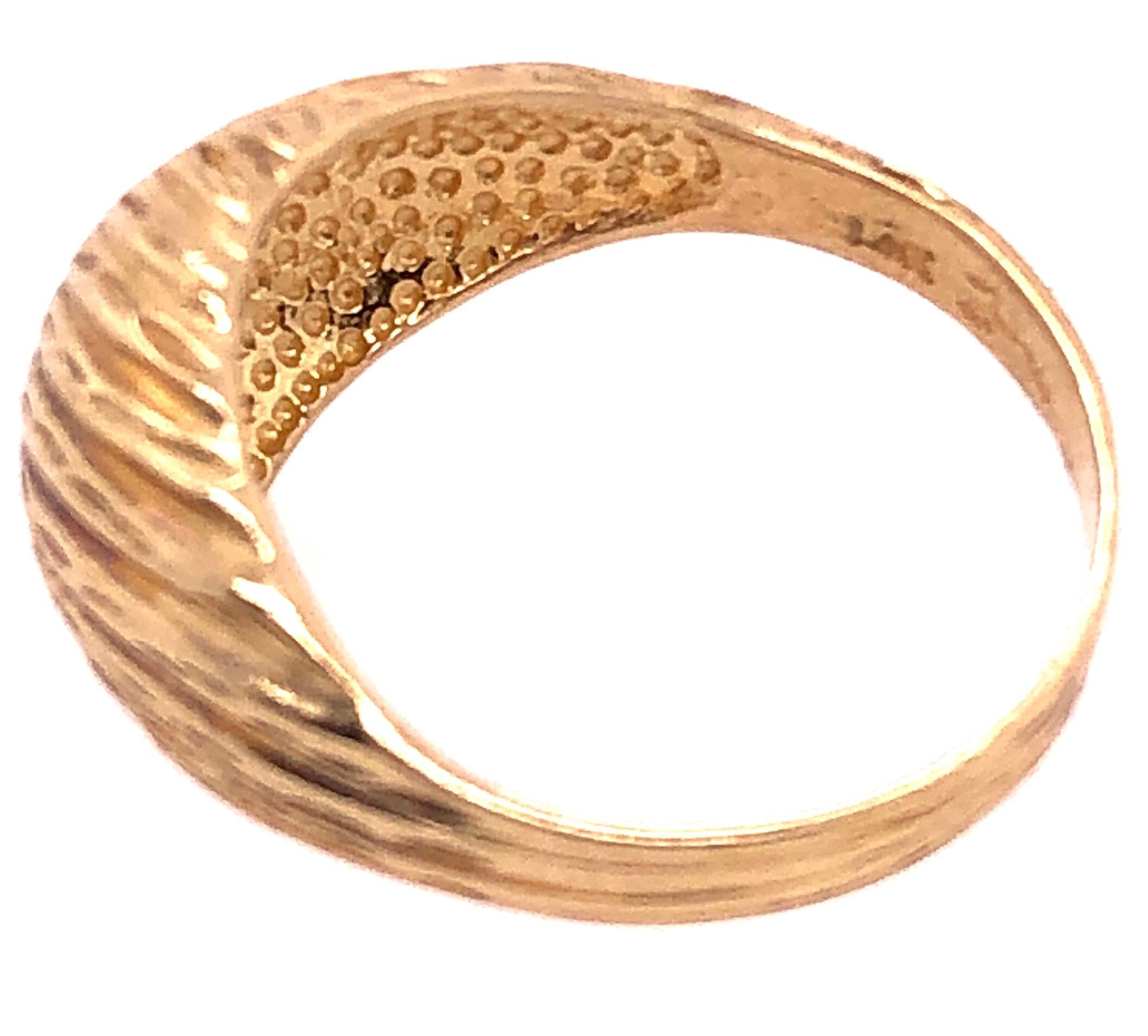 14 Karat Yellow Gold Free Form Ring.
Size 7.75
4 grams total weight.