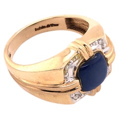 Anillo Contemporáneo de Oro Amarillo de 14 Kilates con Diamantes