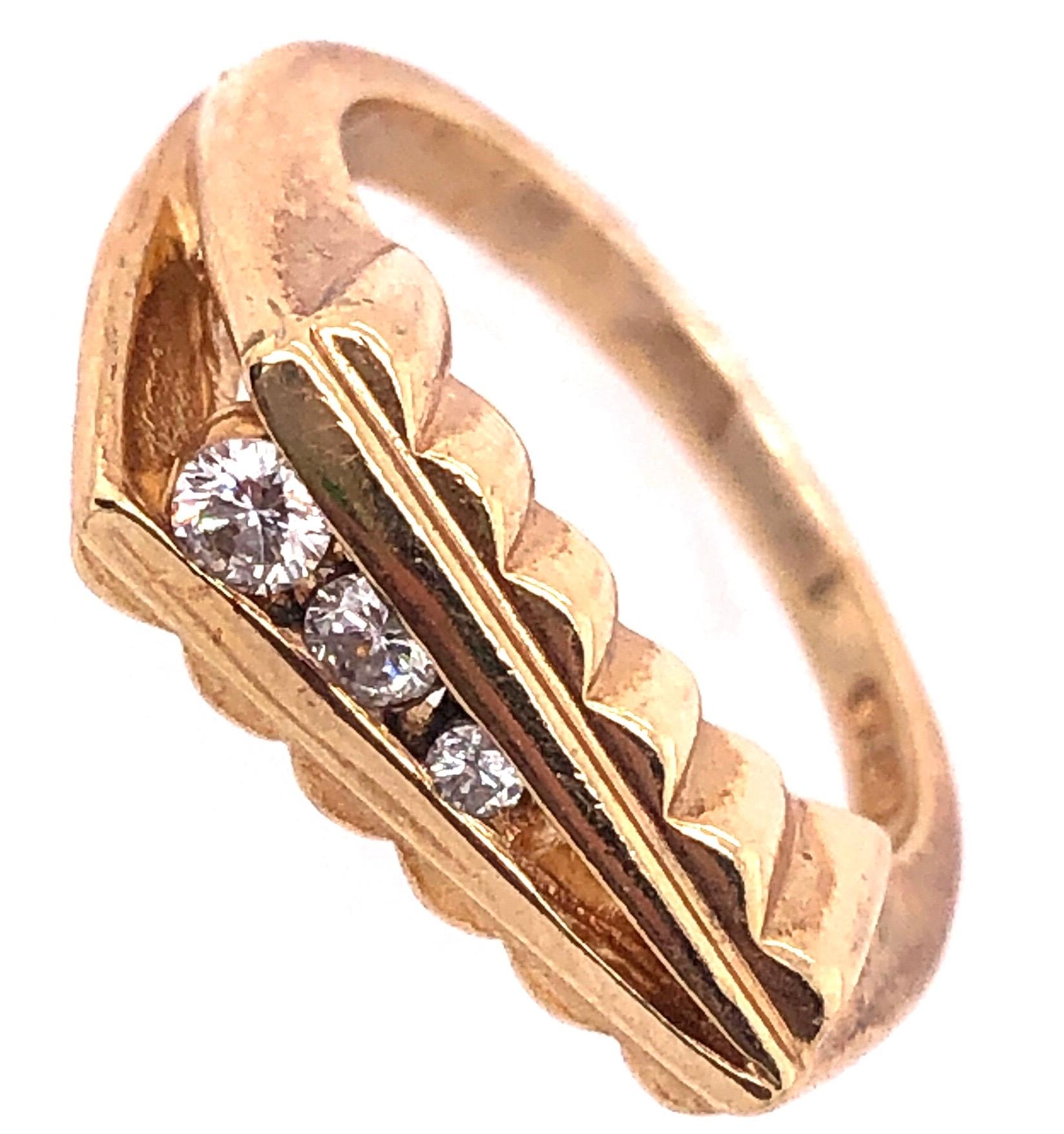 14 Karat Yellow Gold Contemporary Ring with Round Diamonds 0.20 TDW.
Size 6.25
6.10 grams total weight.