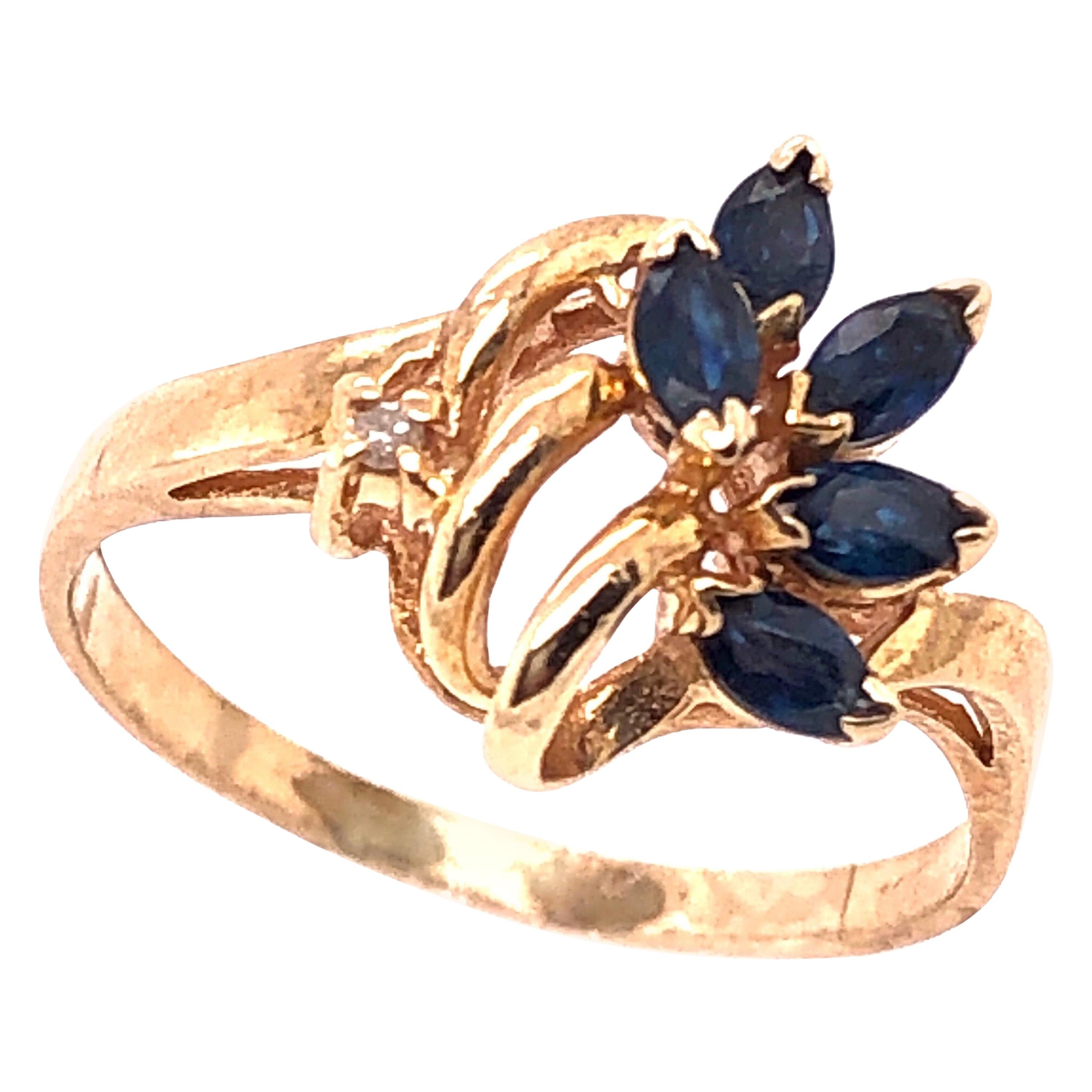 14 Karat Yellow Gold Contemporary Ring with Sapphire and Diamond Accents