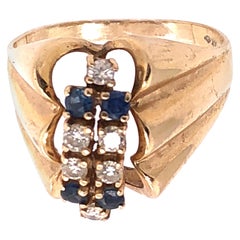 14 Karat Yellow Gold Contemporary Ring with Sapphire and Diamonds