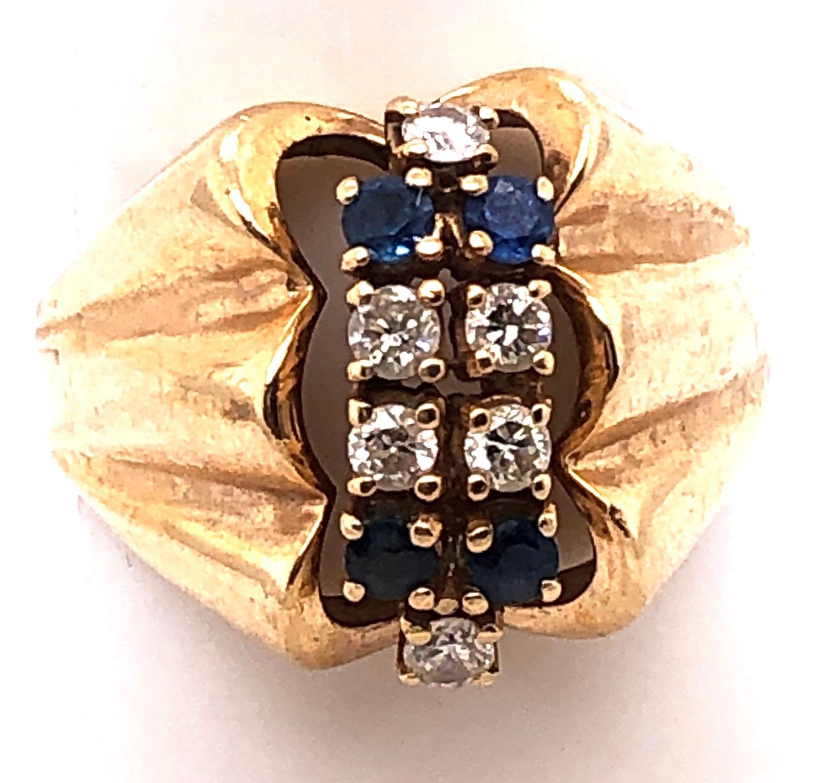 14 Karat Yellow Gold Contemporary Ring with Sapphire and Diamonds For Sale 1