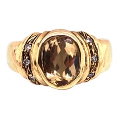 14 Karat Yellow Gold Contemporary Ring with Topaz Center Stone