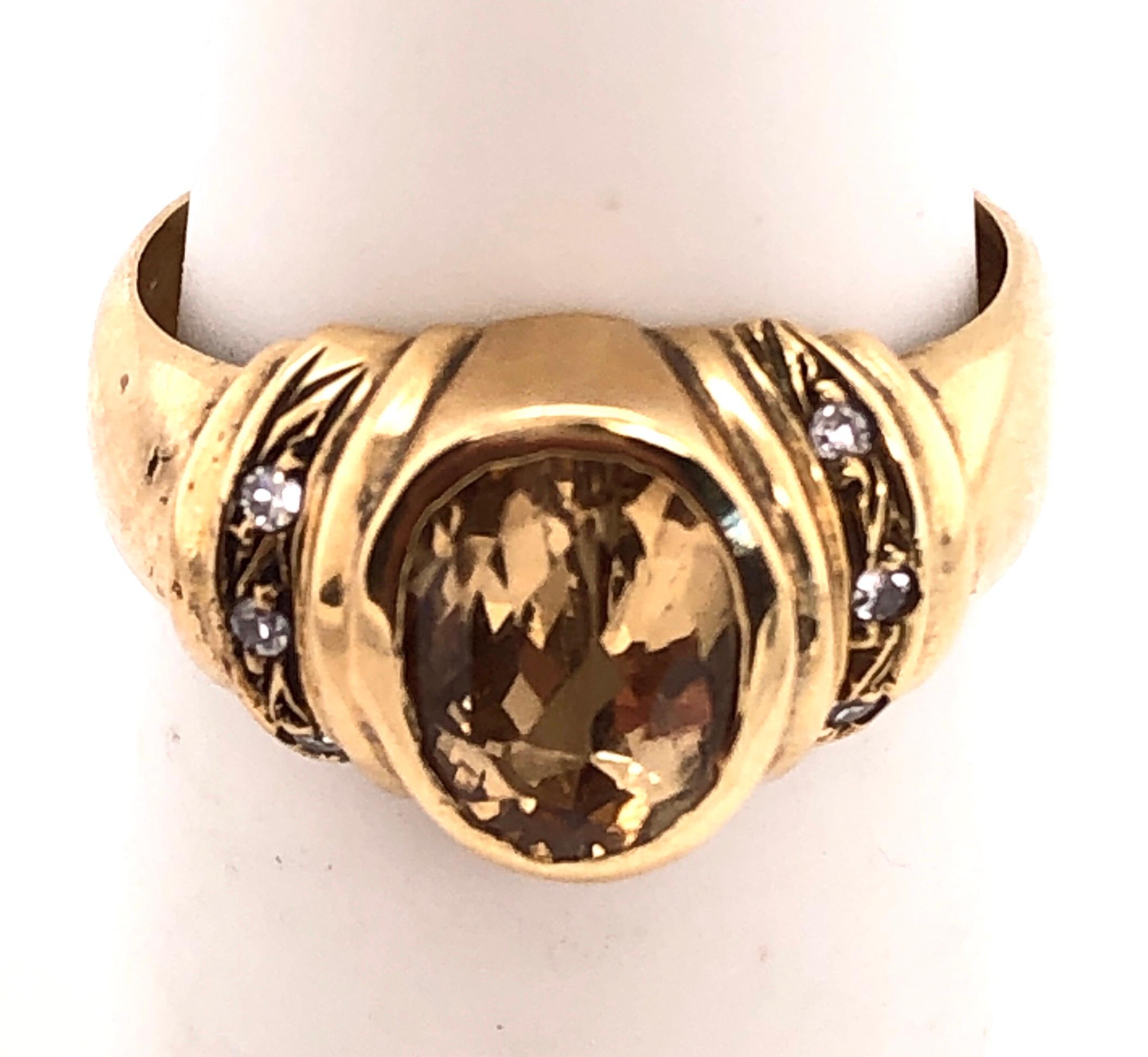 14 Karat Yellow Gold Contemporary Ring With Topaz Center Stone
Size 5.5 with 4.70 grams total weight