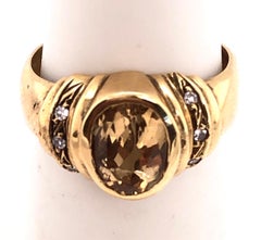14 Karat Yellow Gold Contemporary Ring with Topaz Center Stone
