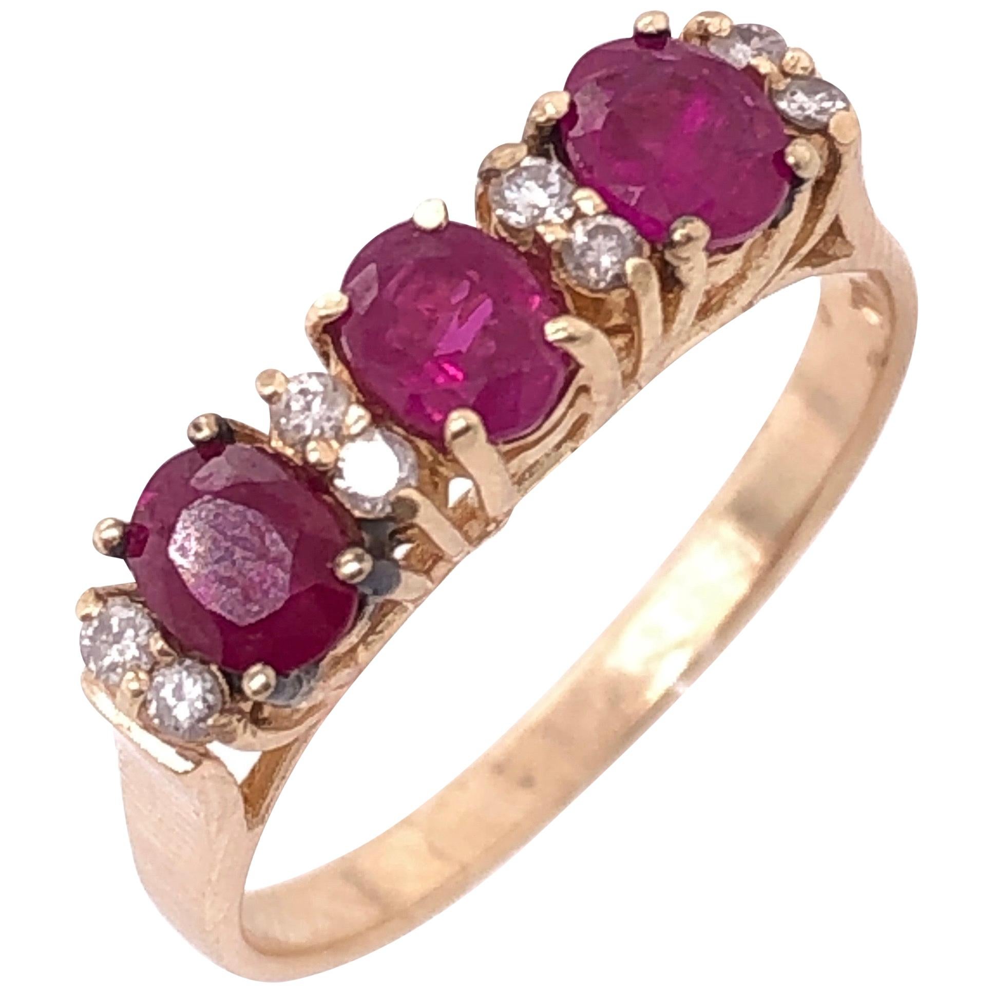 14 Karat Yellow Gold Contemporary Ruby and Diamond Ring For Sale