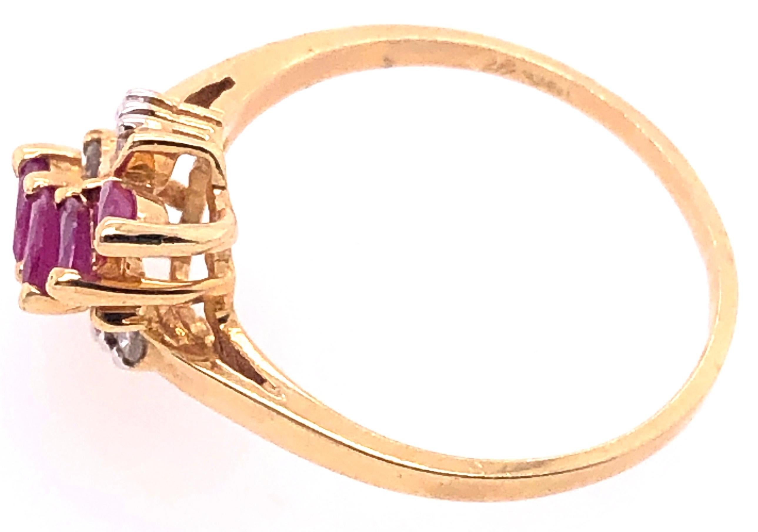 Modern 14 Karat Yellow Gold Contemporary Ruby Ring with Diamond Accents For Sale