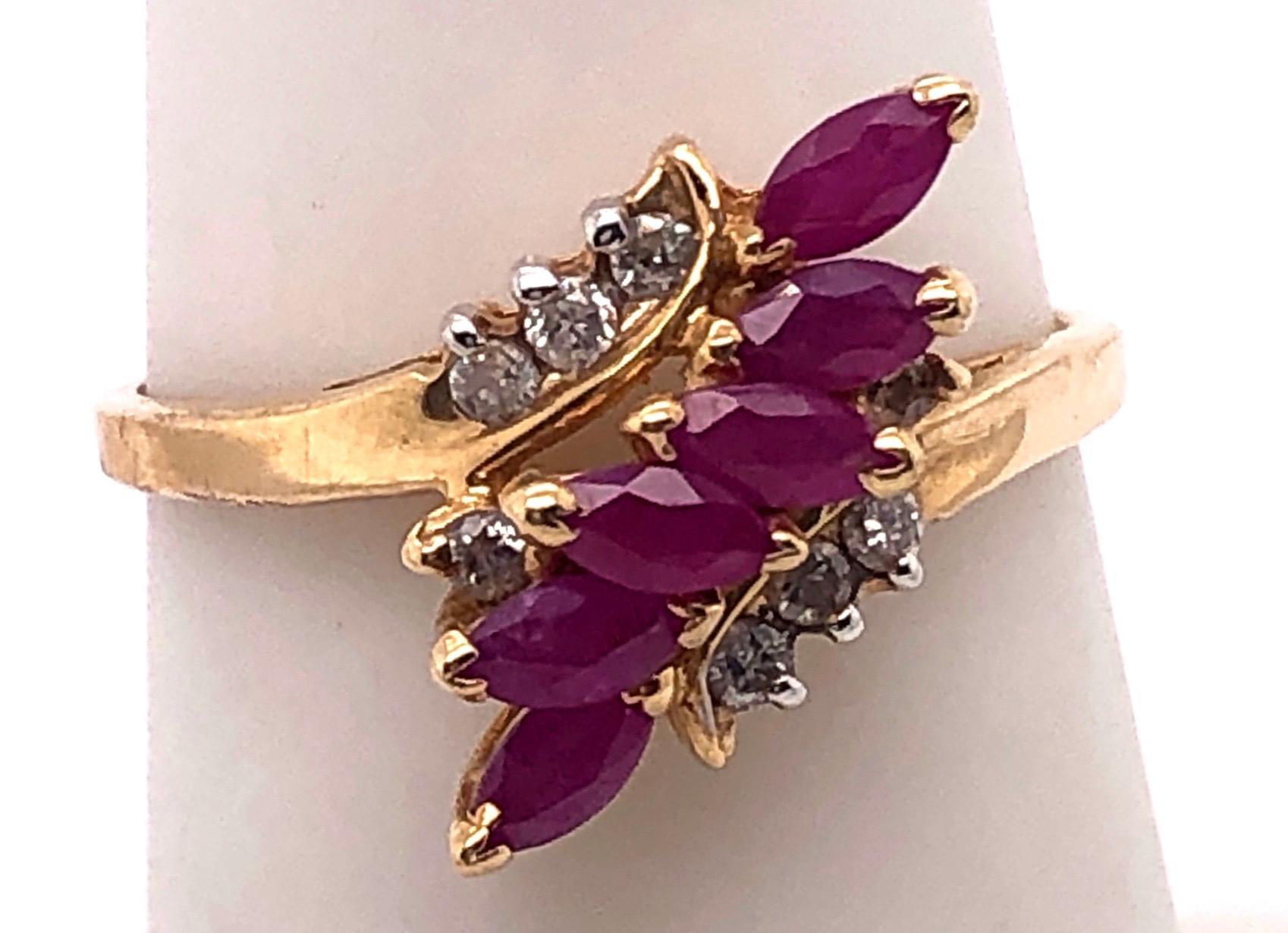 14 Karat Yellow Gold Contemporary Ruby Ring with Diamond Accents In Good Condition For Sale In Stamford, CT
