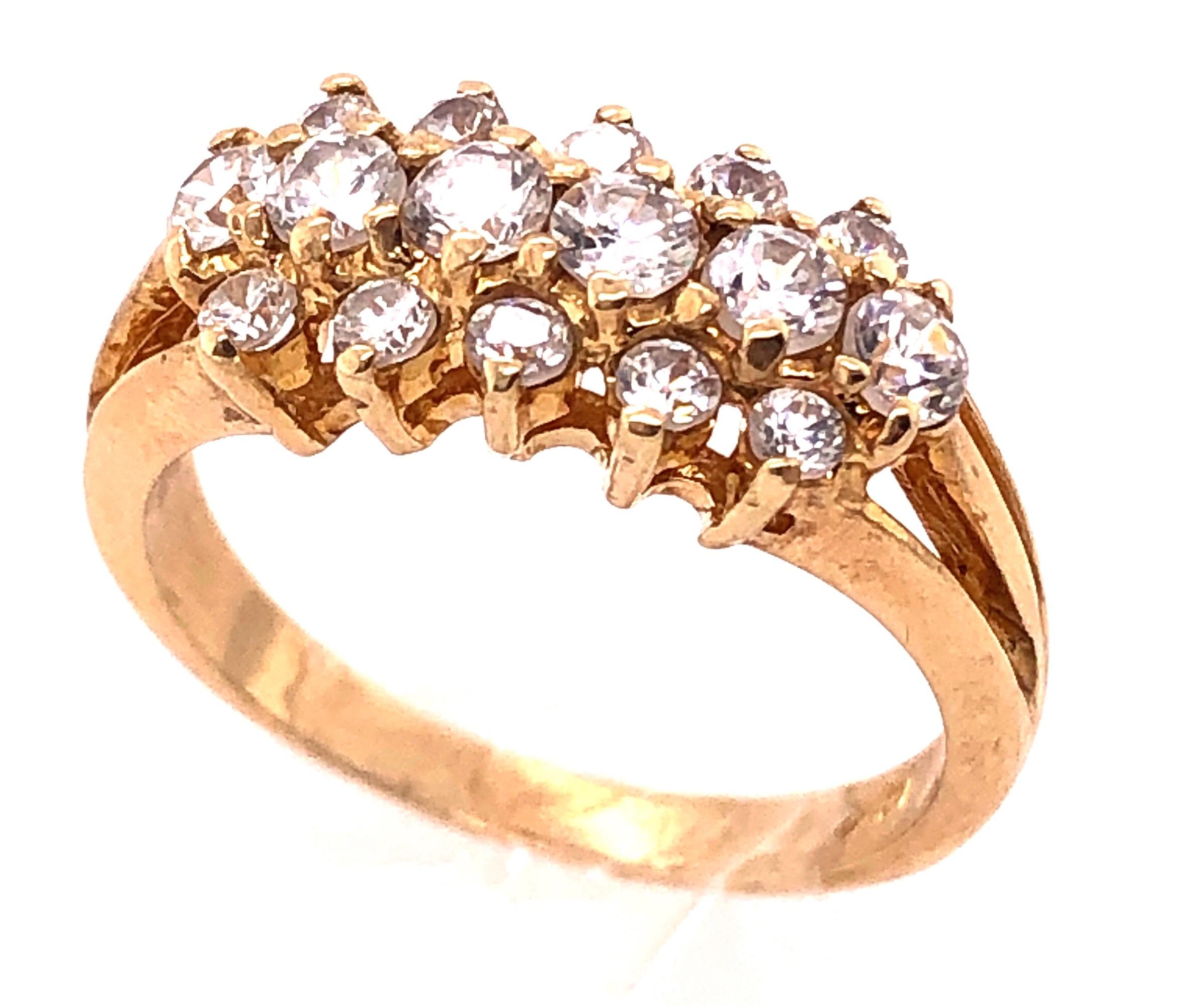 14 Karat Yellow Gold Contemporary Three Tier Diamond Ring 1.00 TDW.
Size 6.5
4 grams total weight.