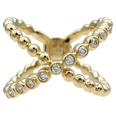 14 Karat Yellow Gold Crisscross Bubble Band Ring with Round Bezel Set Diamonds