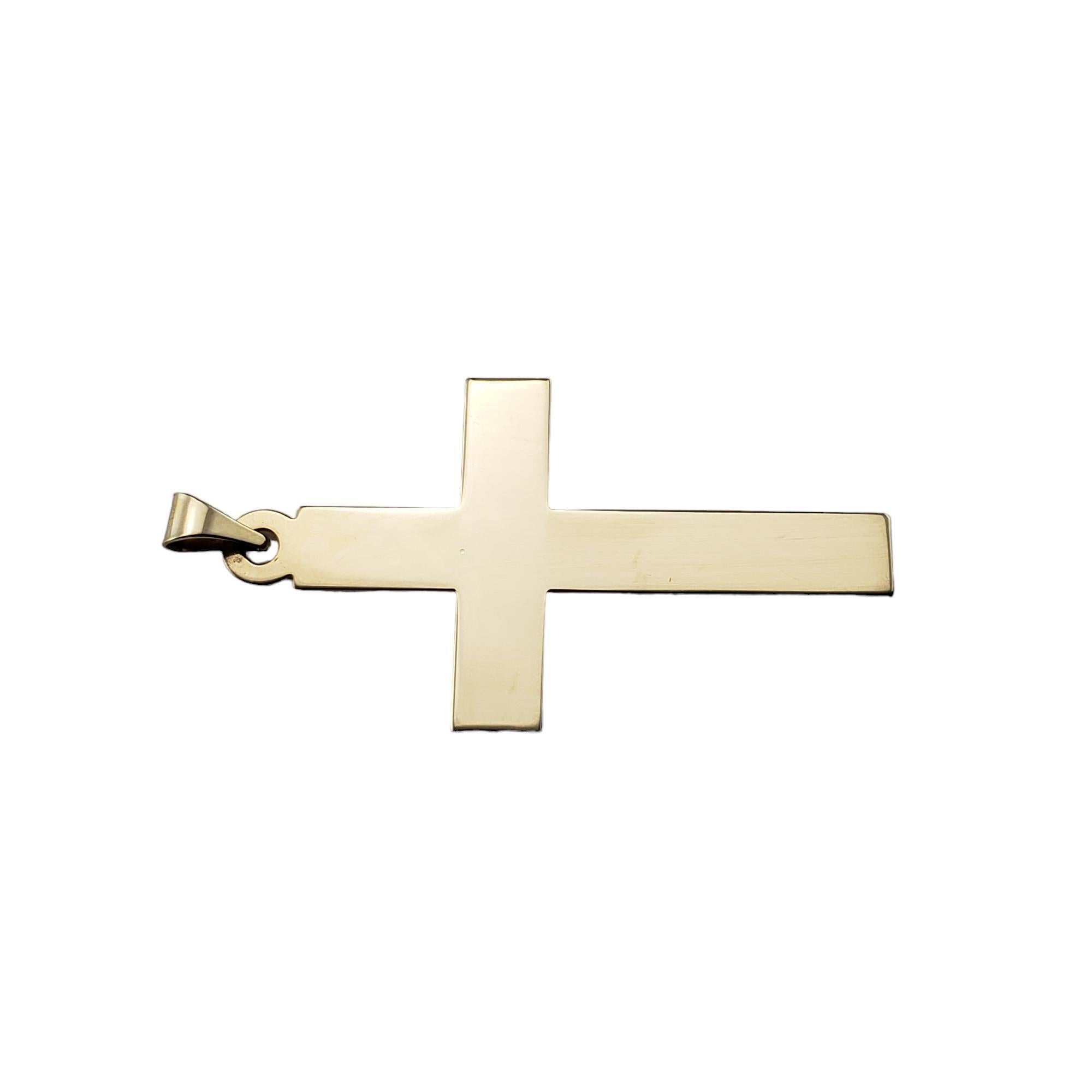 Vintage 14 Karat Yellow Gold Cross Pendant-

This elegant cross pendant is crafted in classic 14K yellow gold.

Size: 44.1 mm x 24.5 mm

Tested 14K gold.

Weight:  3.0 gr./ 1.9 dwt.

Very good condition, professionally polished.

Will come packaged