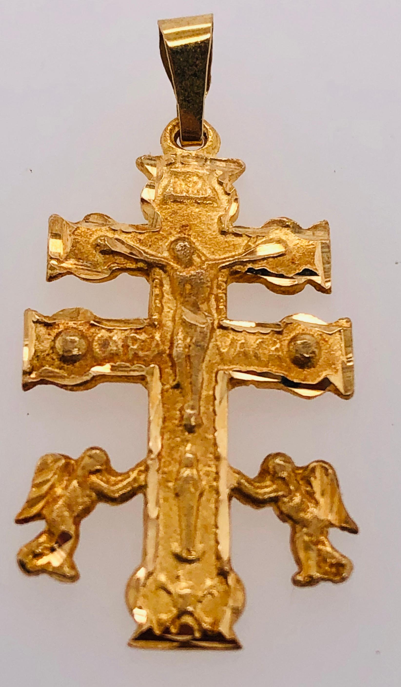 14 Karat Yellow Gold Cross / Religious Pendant
2.00 grams Total weight
25.75MM by 14.90MM. 