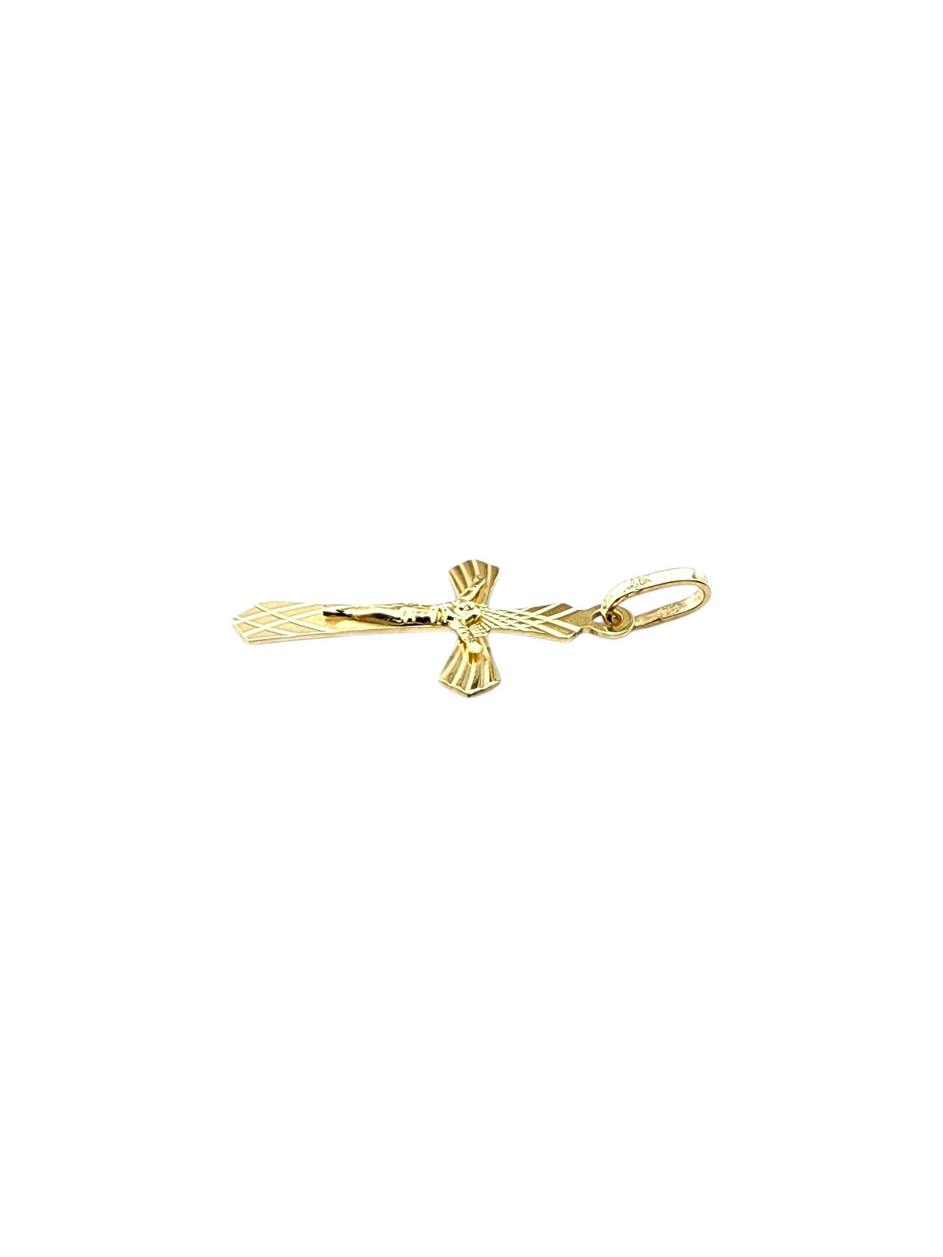 Pendentif crucifix en or jaune 14 carats

Ce pendentif crucifix en or jaune 14 carats présente une finition polie et un motif de croix détaillé avec la figure du Christ. Un symbole classique de foi et de dévotion, parfait pour porter sur une chaîne