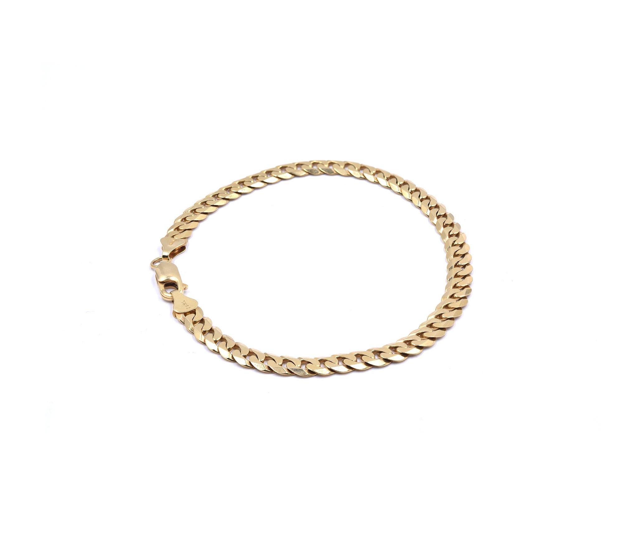 Designer: custom
Material: 14K yellow gold 
Dimensions: bracelet will fit up to a 9.25-inch wrist
Weight: 13.55 grams
