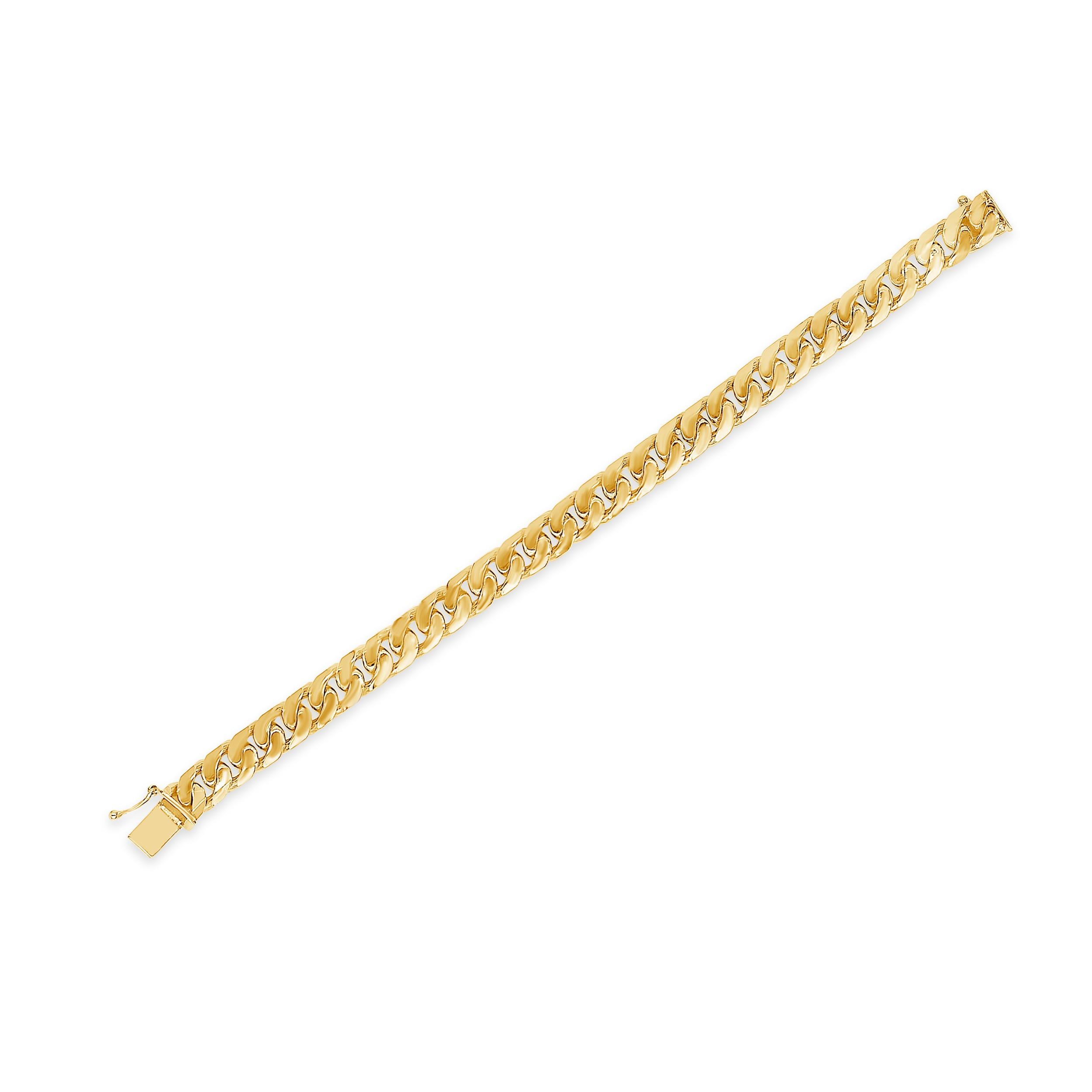 Une chaîne classique à maillons cubains réalisée en or jaune 14 carats. Pèse 55,43 grammes. 7.5 pouces de longueur.

