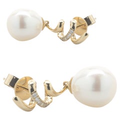 14 Karat Yellow Gold Cultured Freshwater Pearl and Diamond Fancy Drop Earrings 14 Karat Yellow Gold Cultured Freshwater Pearl and Diamond Fancy Drop Earrings