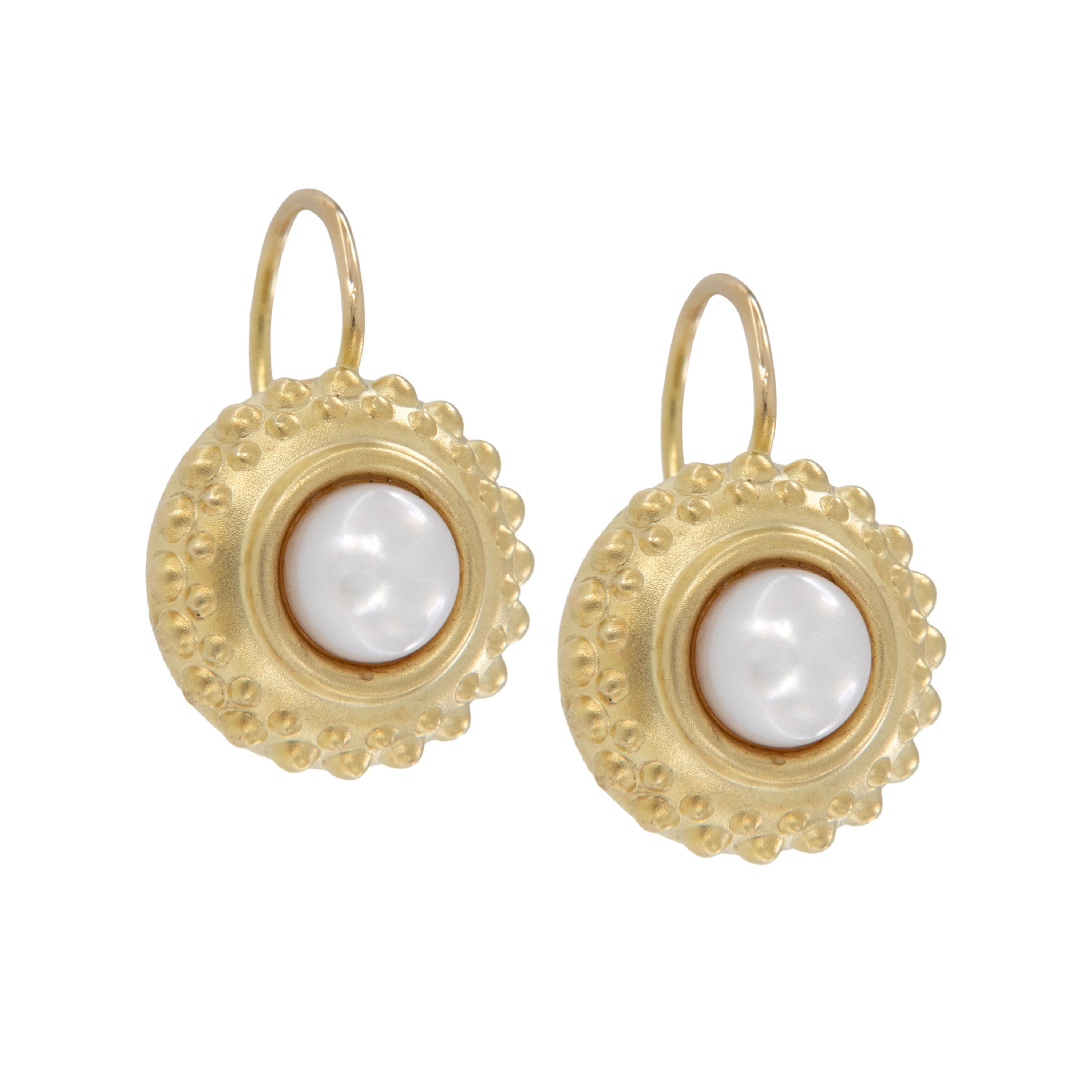 Vintage Byzantine style cultured pearl drop earrings crafted from satin finished 14 karat yellow gold. Made in button style with double beaded bezel hanging from lever backs for security of wear, these earrings are set with 3/4 cultured pearls,