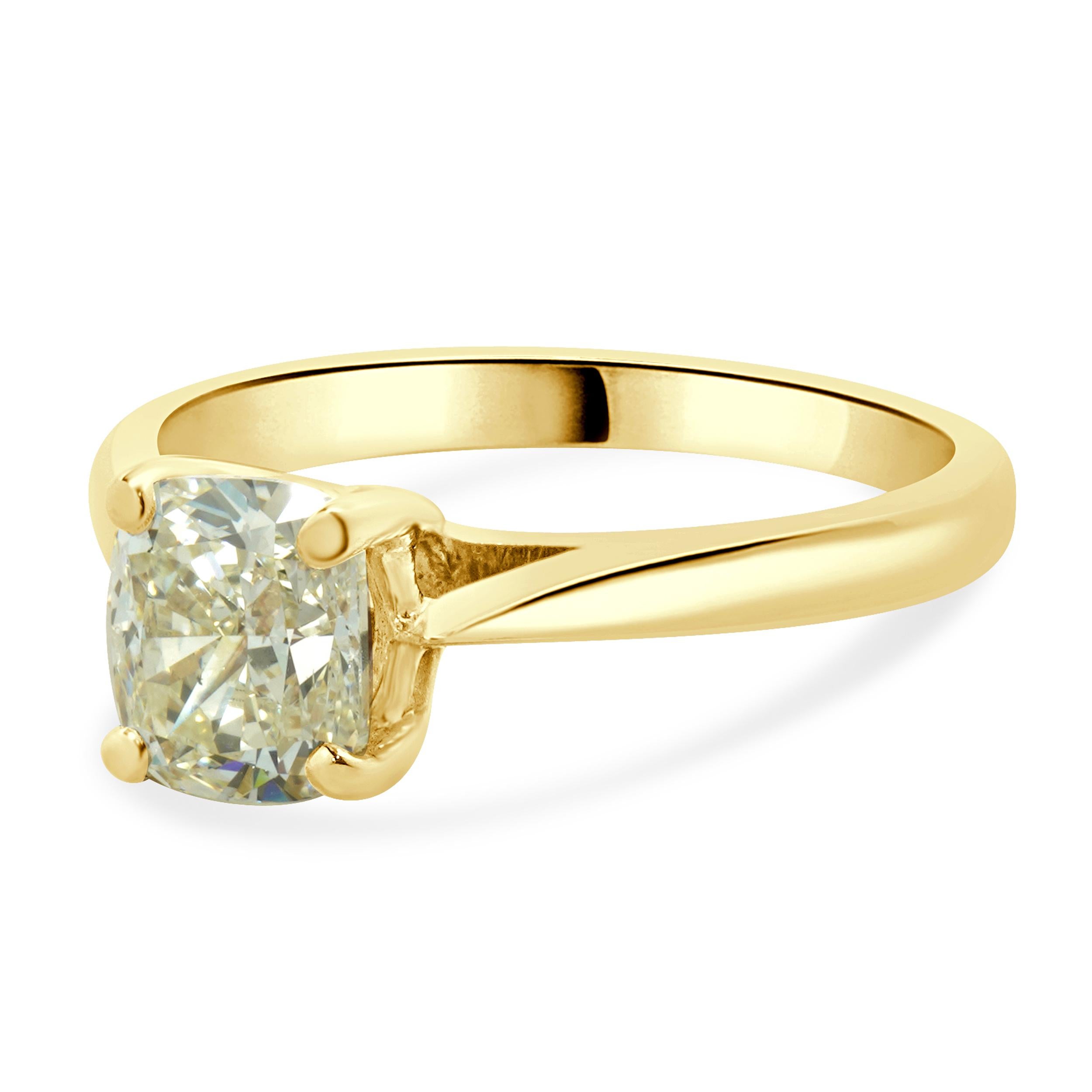Designer: custom
Material: 14K yellow gold
Diamond: 1 cushion cut = 1.50ct
Color: O / P
Clarity: SI2
GIA: 2231087261
Dimensions: ring top measures 7mm wide
Ring Size: 7.5 (complimentary sizing available)
Weight: 3.75 grams
