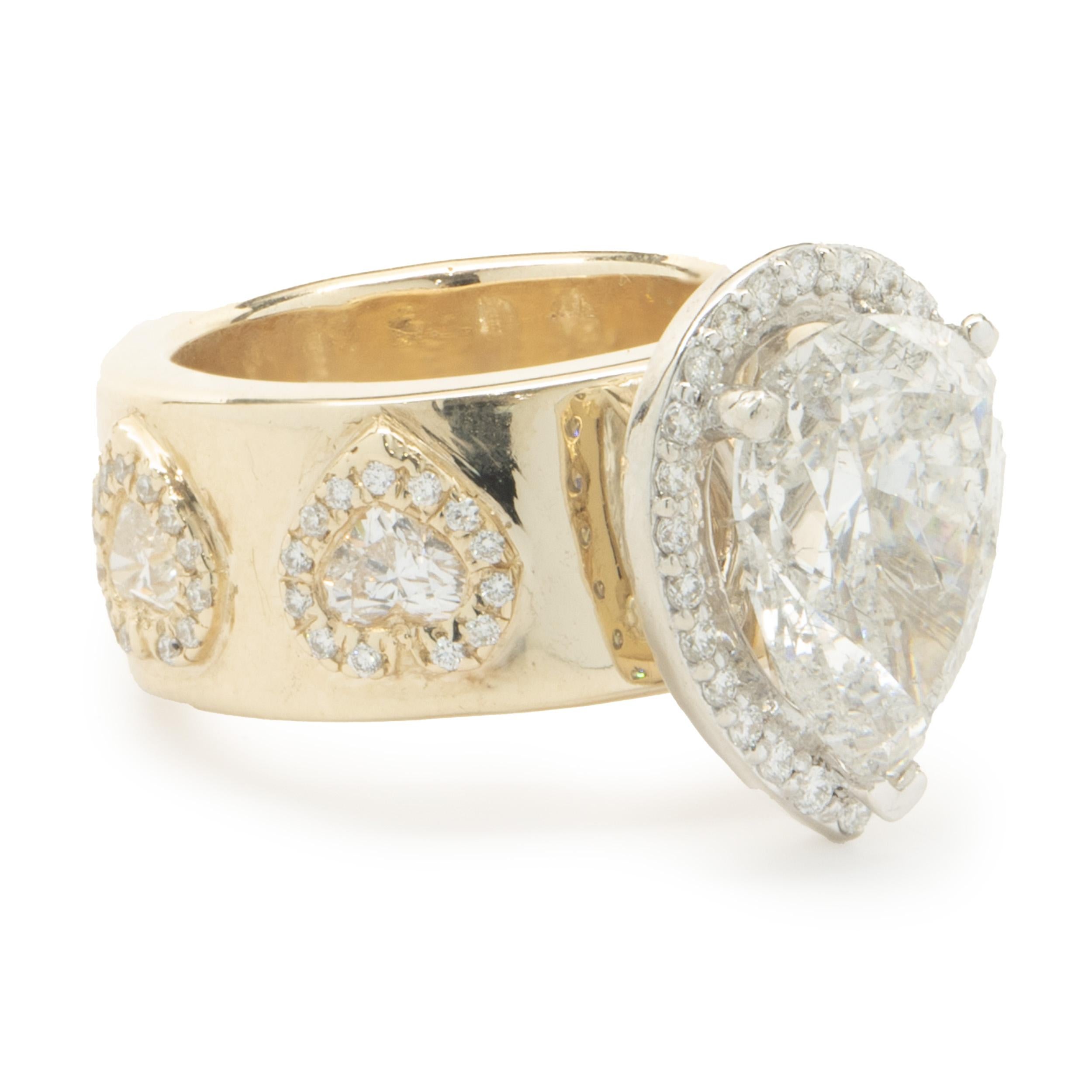 Women's 14 Karat Yellow Gold Custom Designed Pear Cut Diamond Engagement Ring For Sale