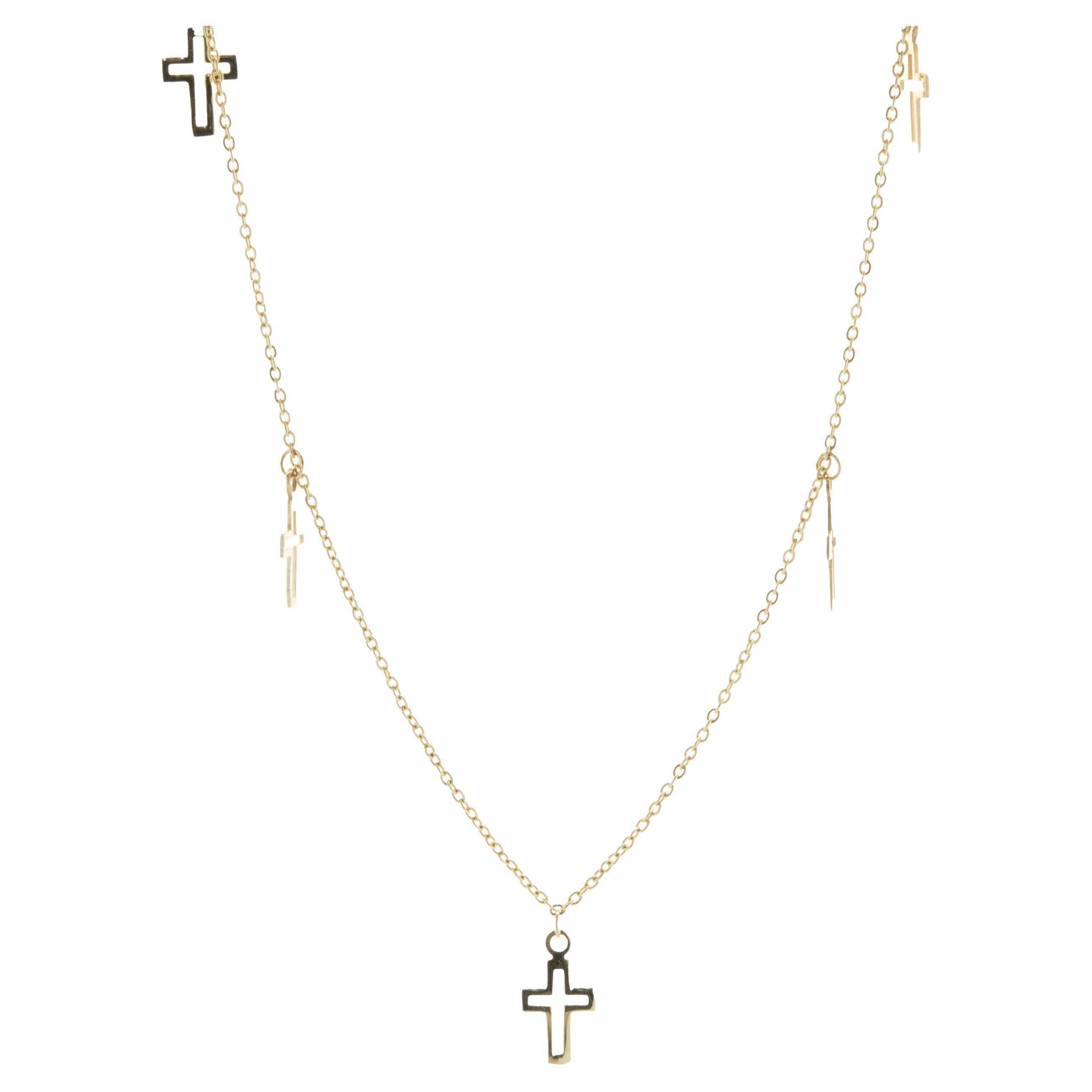 14 Karat Yellow Gold Cutout Cross Station Necklace For Sale