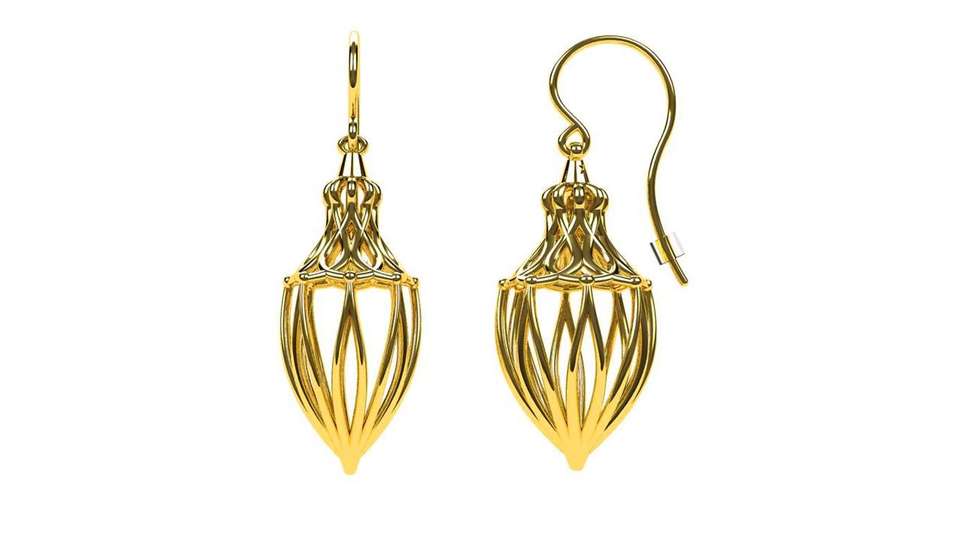Arabesque Lace Earrings Series: These 14 karat yellow gold dangle earrings came from a number of inspirations. Using my sculptural ideas with moire patterns, 3 dimensions, lace, and Arabic geometry.  Each becomes a little sculpture for the ears. A