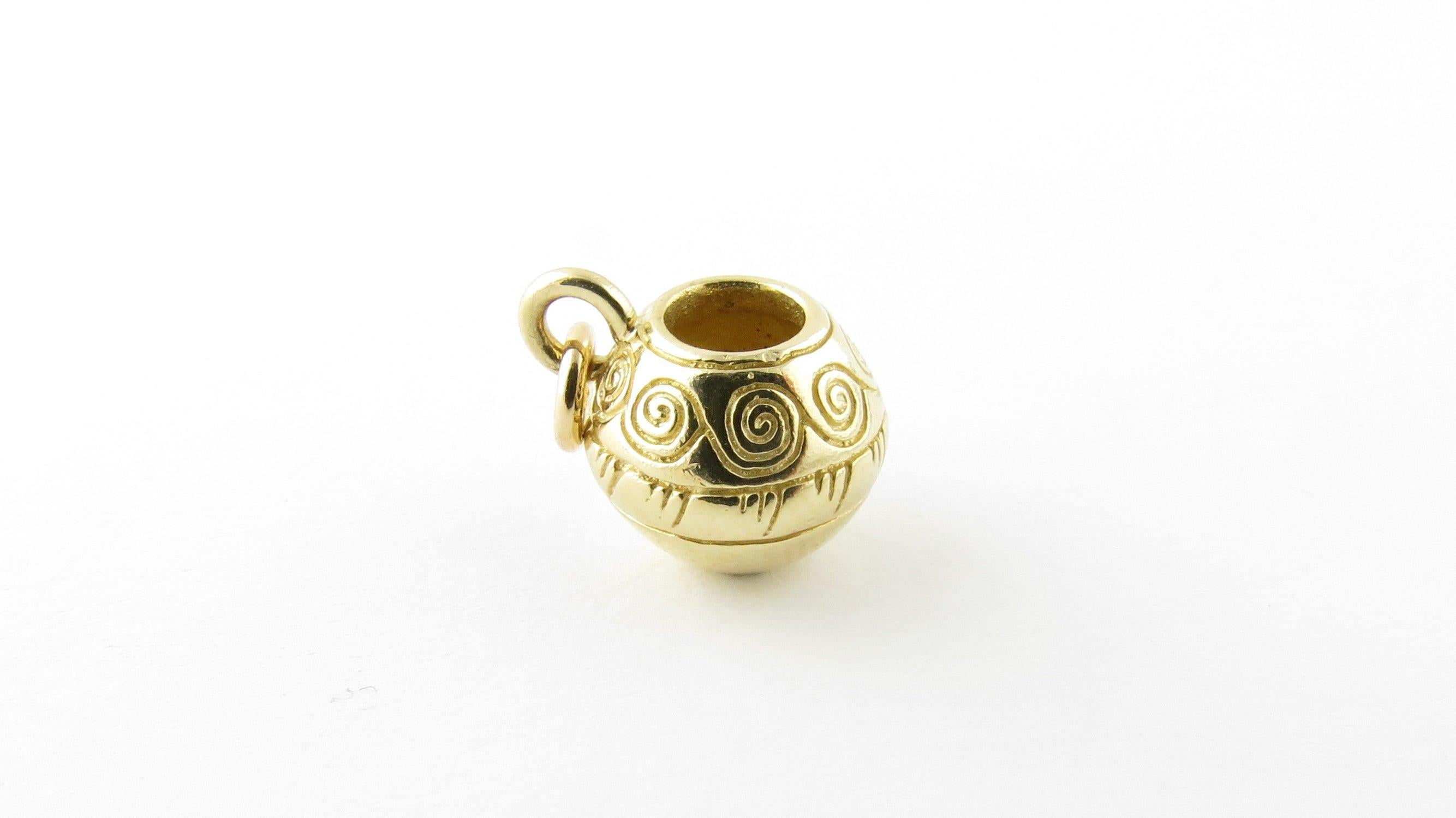 Vintage 14 Karat Yellow Gold Decorative Urn Charm- This lovely 3D charm features a miniature urn meticulously detailed in 14K yellow gold. Size: 10 mm x 10 mm (actual charm) Weight: 2.1 dwt. / 3.3 gr. Stamped: Acid tested for 14K gold. Very good