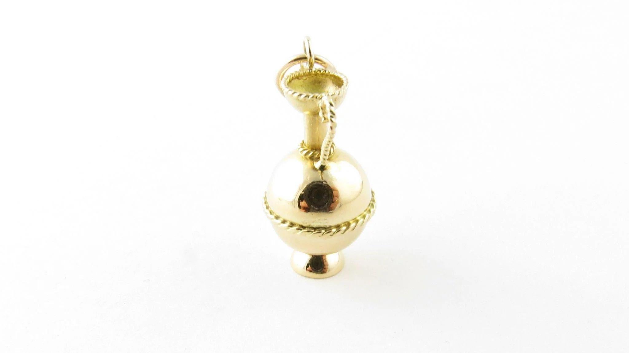 Vintage 14 Karat Yellow Gold Decorative Urn Charm- This lovely 3D charm features a miniature urn meticulously detailed in 14K yellow gold. Size: 21 mm x 12 mm Weight: 1.0 dwt. / 1.7 gr. Stamped: 14K Very good condition, professionally polished.