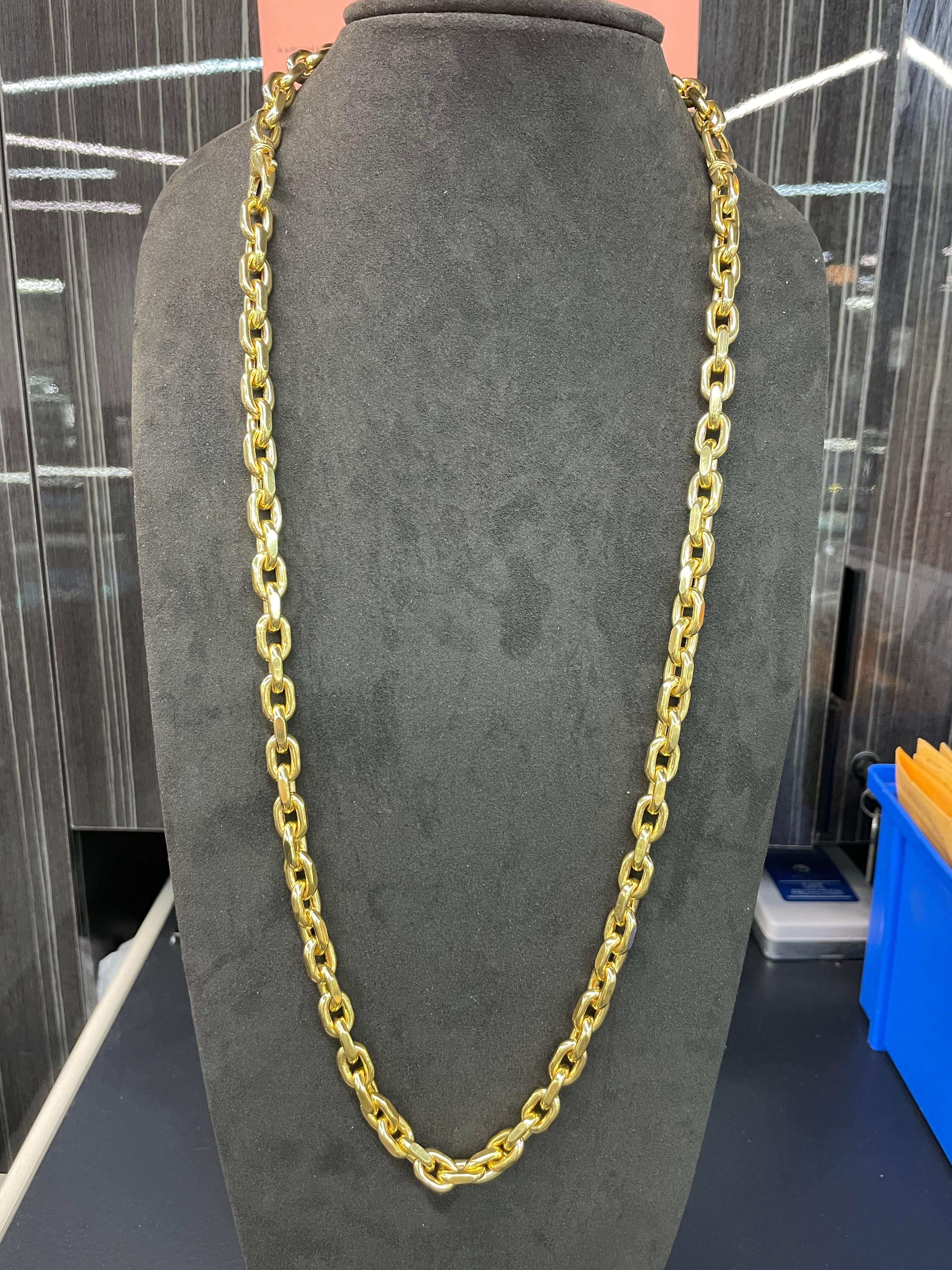 14 Karat Yellow Gold chain featuring high polish links that can be worn as a necklace and/or bracelet. 
The necklace is 24 inches and 52.85 grams. The bracelet is 9 inches and 20.5 grams. Bracelet can be shortened to any length and be attached to