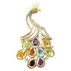 14 Karat Yellow Gold Diamond and Gemstone Peacock Pendant