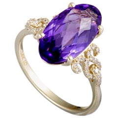 14 Karat Yellow Gold Diamond and Oval Amethyst Ring 14 Karat Yellow Gold Diamond and Oval Amethyst Ring