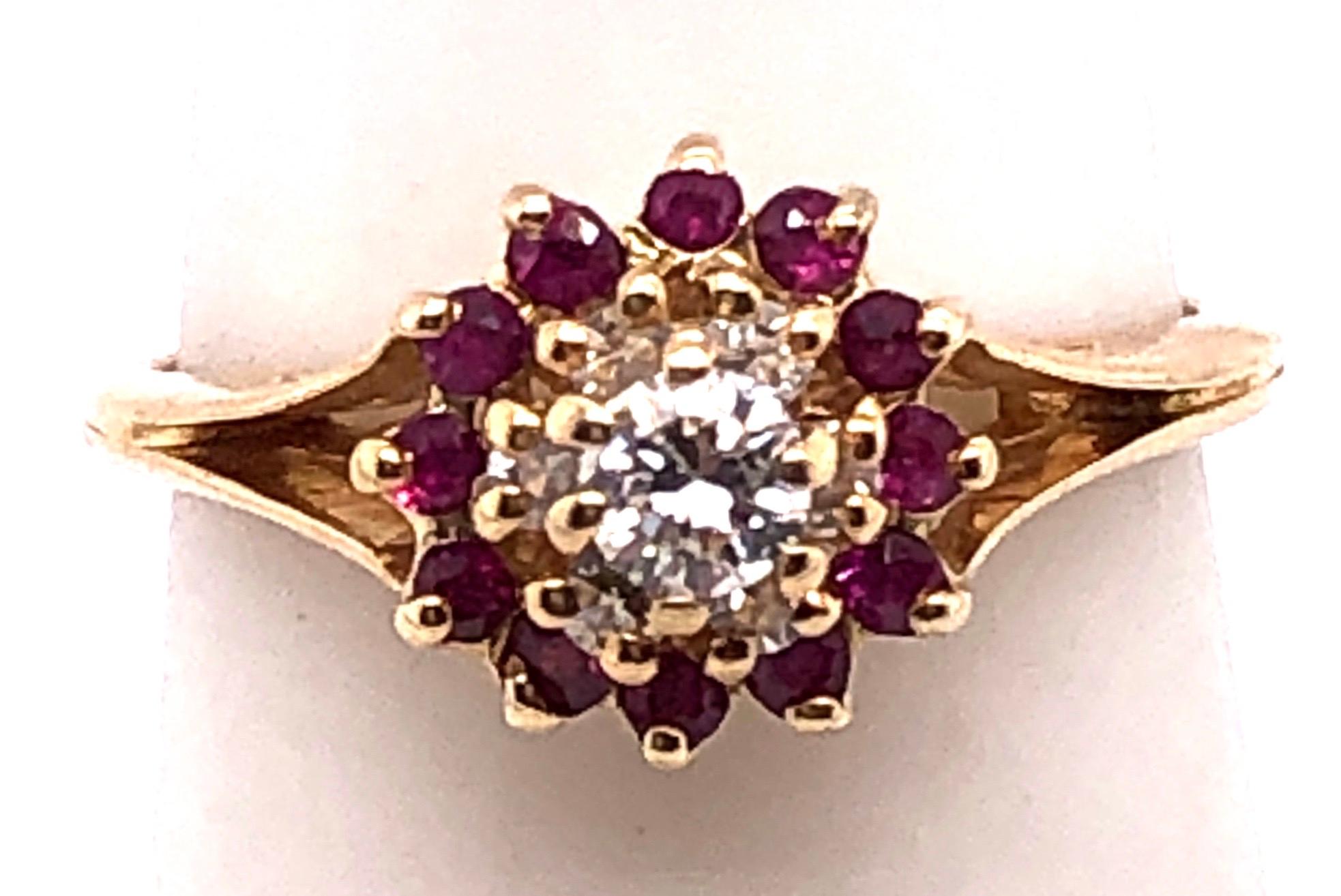 14 Karat Yellow Gold Contemporary Ring with Stones 0.20 Total Diamond Weight.
Size 6 
2.60 grams total weight.
