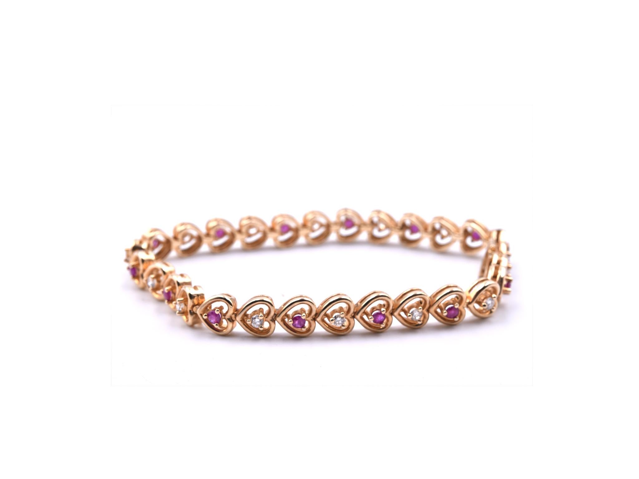 Designer: custom design
Material: 14k yellow gold
Diamond: 14=.45cttw
Color: H
Clarity: SI1
Ruby: 14 rubies 
Dimensions: bracelet is 6 ¾ inch long and 6.60 mm wide 
Weight: 15.29 grams
