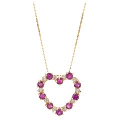 14 Karat Yellow Gold Diamond and Ruby Open Heart Necklace