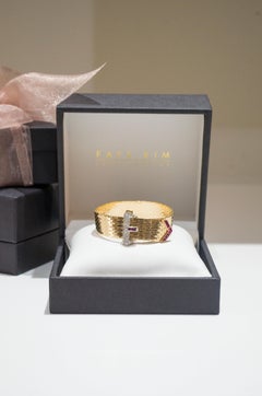 14 Karat Yellow Gold Diamond and Ruby Vintage Flexible Buckle Bracelet