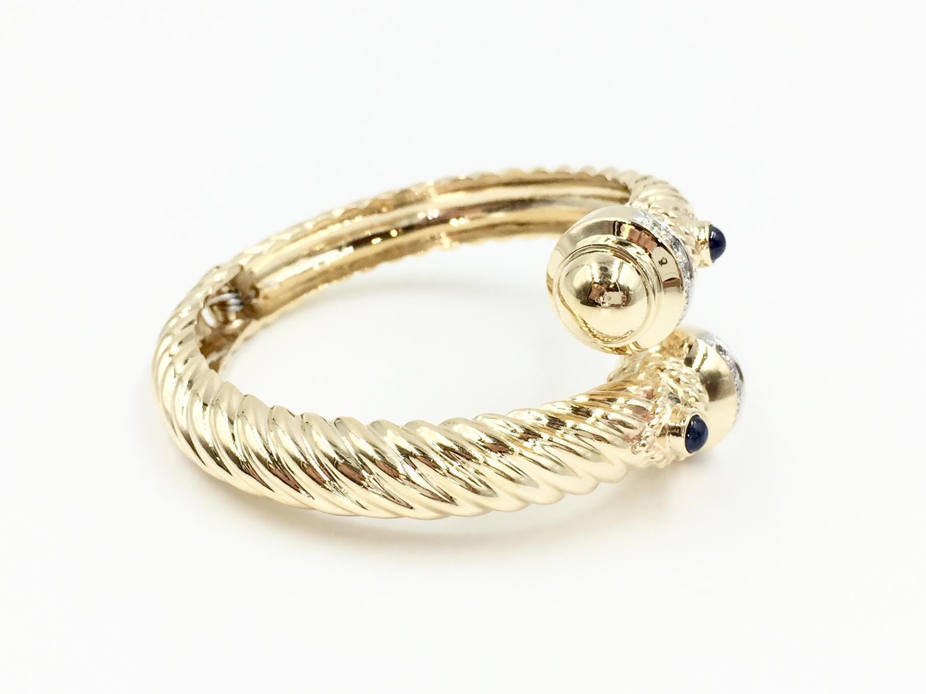 Retro 14 Karat Yellow Gold Diamond and Sapphire Bypass Cable Cuff Bracelet