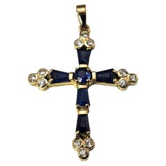 14 Karat Yellow Gold Diamond and Sapphire Cross Pendant