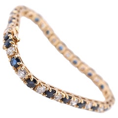 14 Karat Yellow Gold Diamond and Sapphire Tennis Bracelet