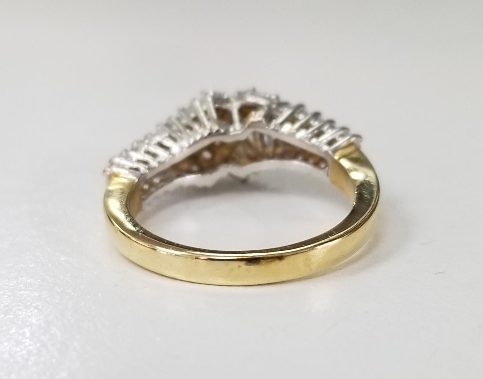 Baguette Cut 14 Karat Yellow Gold Diamond Baguette and Round Set Ring For Sale