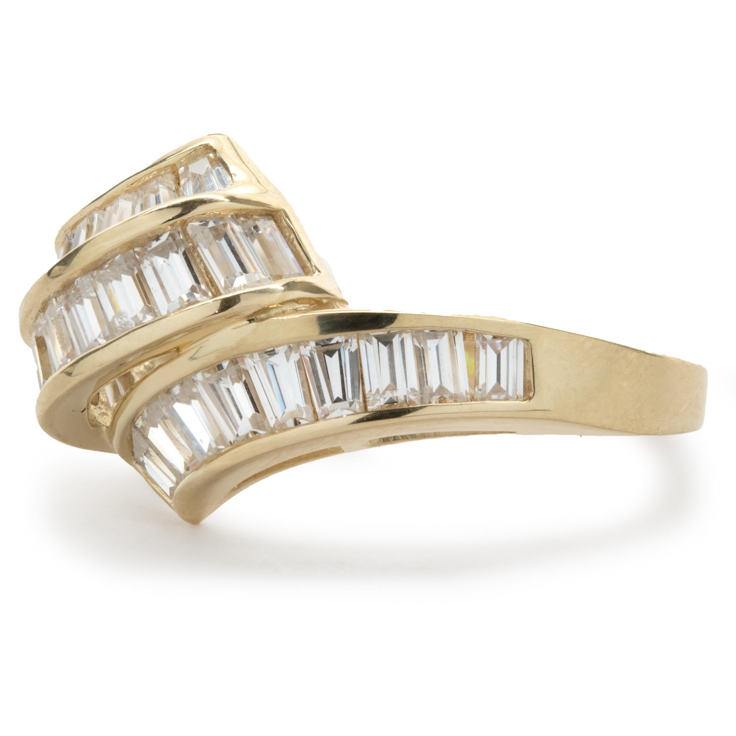 Designer: custom
Material: 14K yellow gold
Diamond: 27 baguette cut = 1.50cttw
Color: G
Clarity: SI1
Ring size: 9.25 (please allow two additional shipping days for sizing requests)
Weight:  5.02 grams