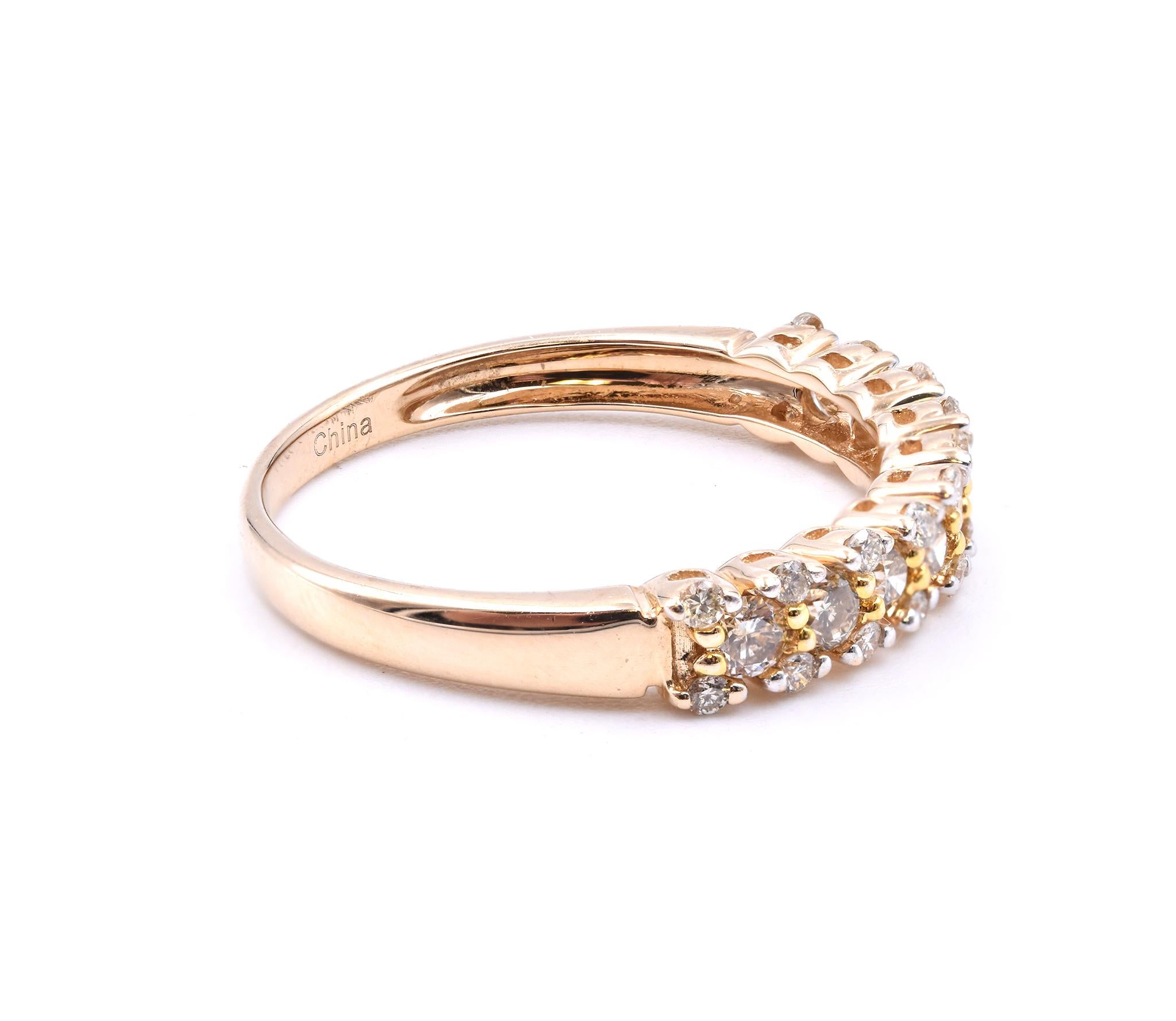 Designer: custom
Material: 14k yellow gold
Diamonds: 9 round cut = .27cttw
Color: Champagne
Diamonds: 20 round cut = .20cttw
Color: H
Clarity: SI1
Size: 7.25 (please allow two additional shipping days for sizing requests)  
Dimensions: ring measures