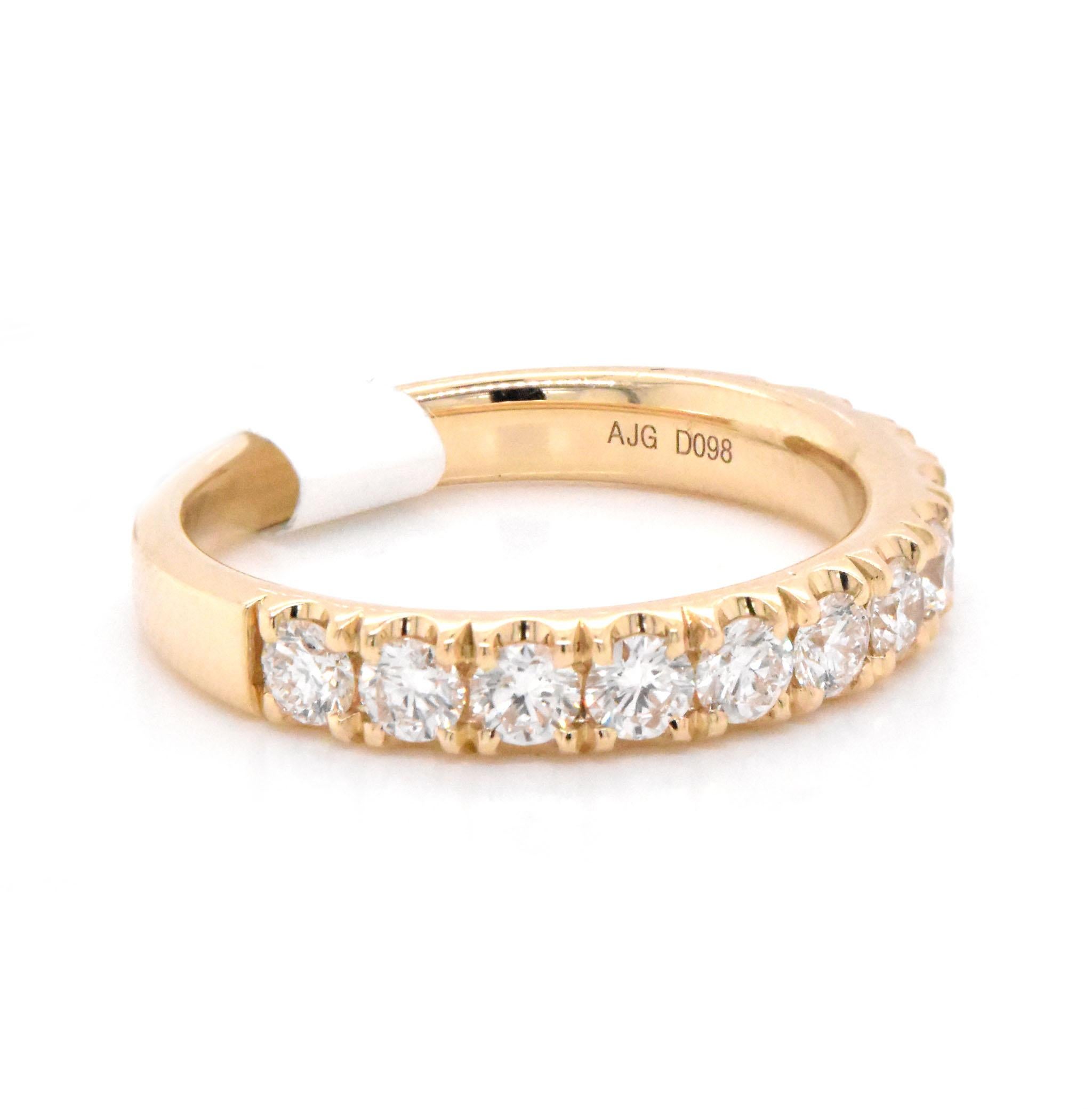 Designer: custom
Material: 14k yellow gold
Diamonds: 12 round cut = 1.00cttw
Color: G
Clarity: VS
Size: 7 (please allow two additional shipping days for sizing requests)  
Dimensions: ring measures 3.5mm in width
Weight: 3.91 grams
