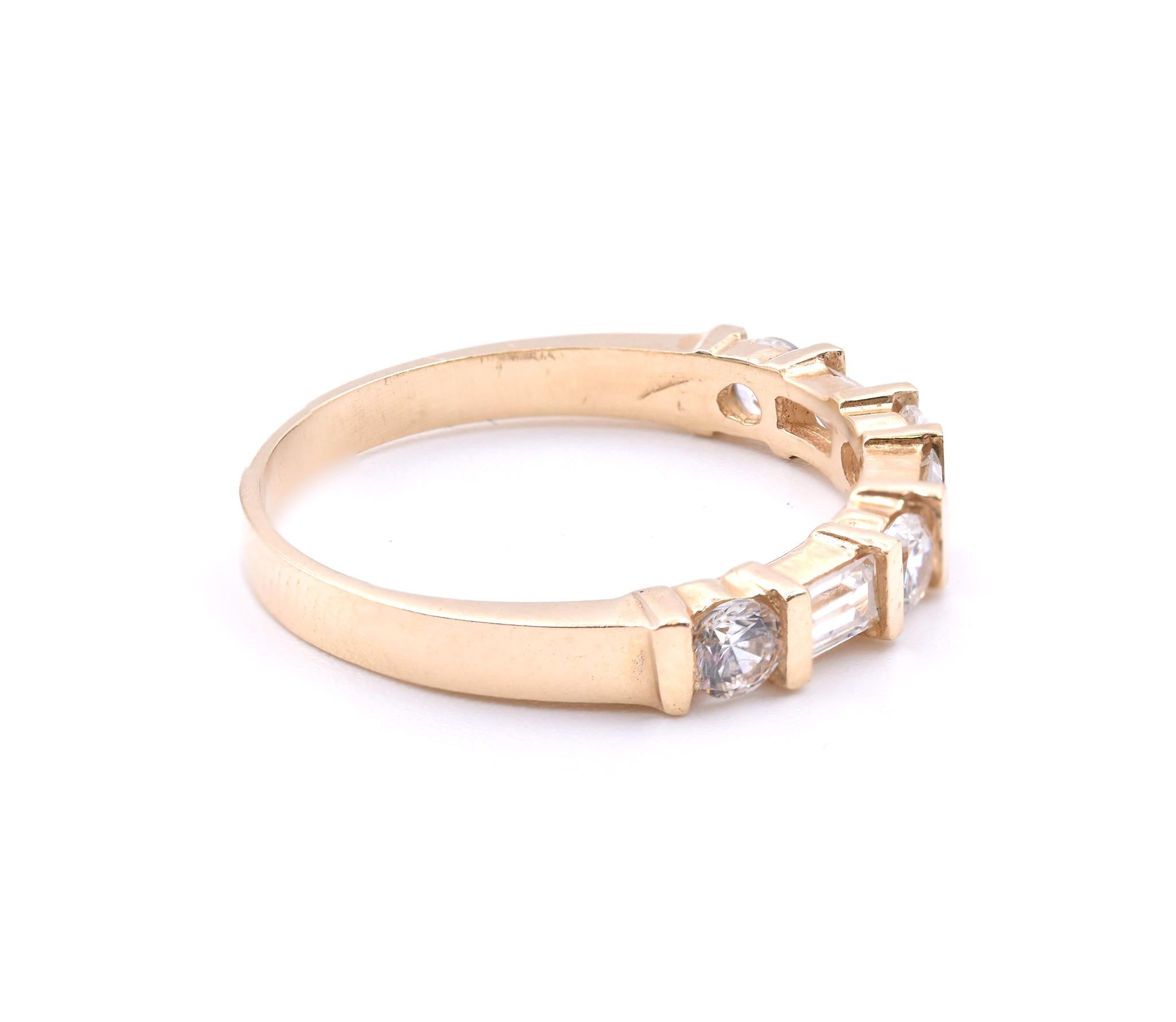 Designer: custom
Material: 14k yellow gold
Diamonds: 4 round cut = .30cttw
Color: G
Clarity: VS
Diamonds: 3 baguette cut = .27ct
Color: G
Clarity: VS
Size: 5.75 (please allow two additional shipping days for sizing requests)  
Dimensions: ring