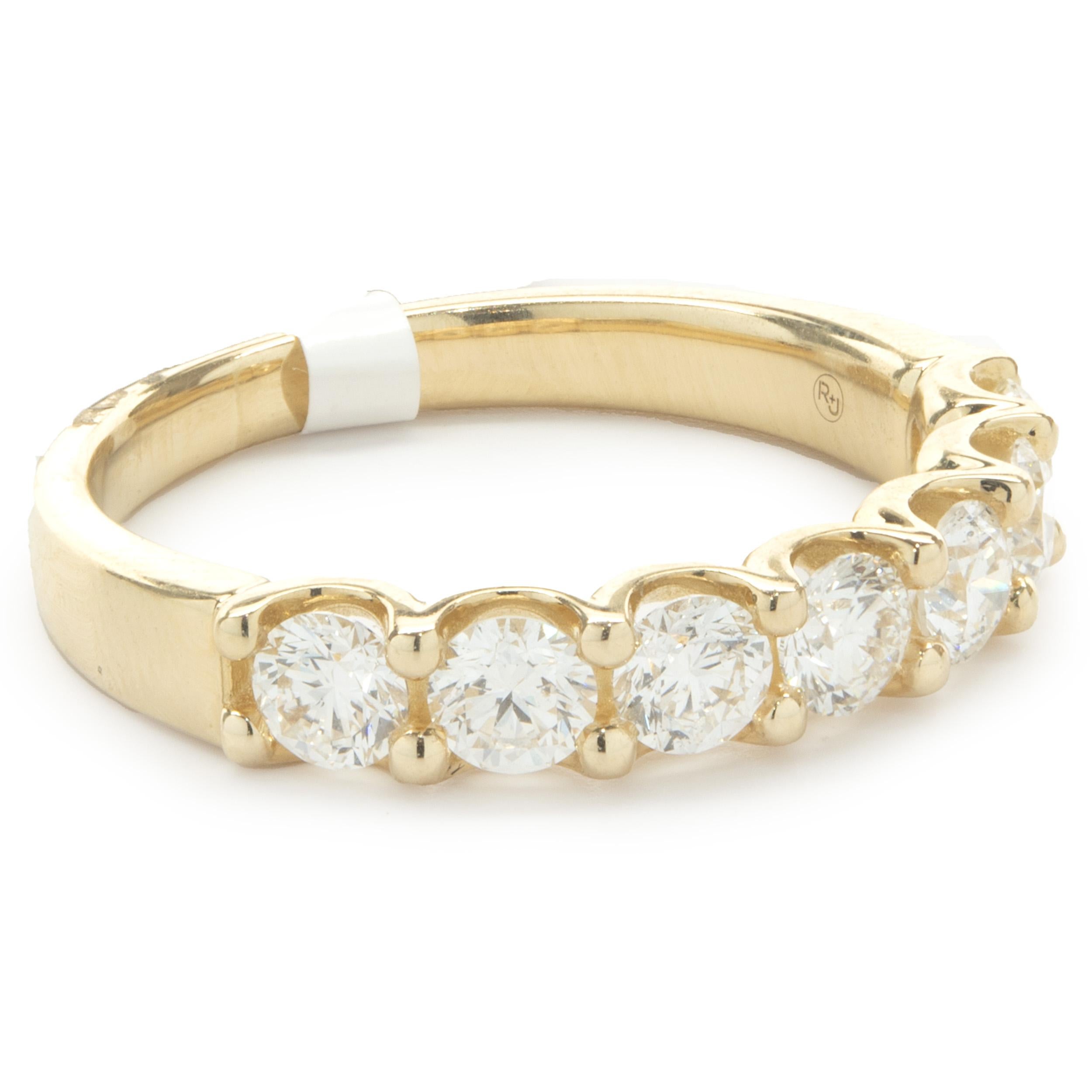 Designer: custom
Material: 14K yellow gold
Diamond: 7 round brilliant cut = 1.00cttw
Color: H
Clarity: VS2
Size: 6.5 (complimentary sizing available) 
Weight: 3.27 grams