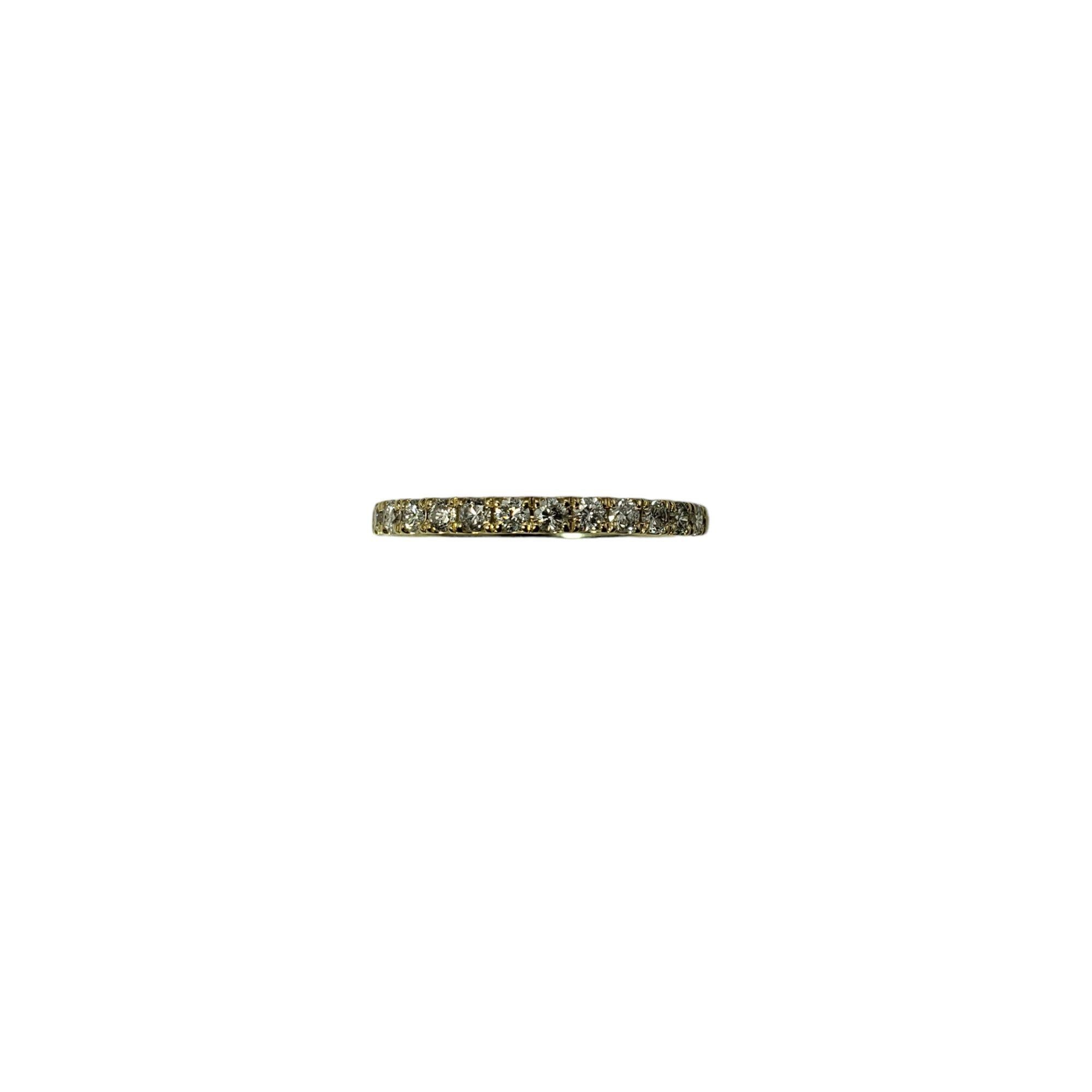 Vintage 14 Karat Yellow Gold Diamond Band Ring Size 6.75-

This sparkling band features 13 round brilliant cut diamonds set in classic 14K yellow gold. Width: 2 mm.

Approximate total diamond weight: .39 ct.

Diamond clarity: I1-I2

Diamond color: