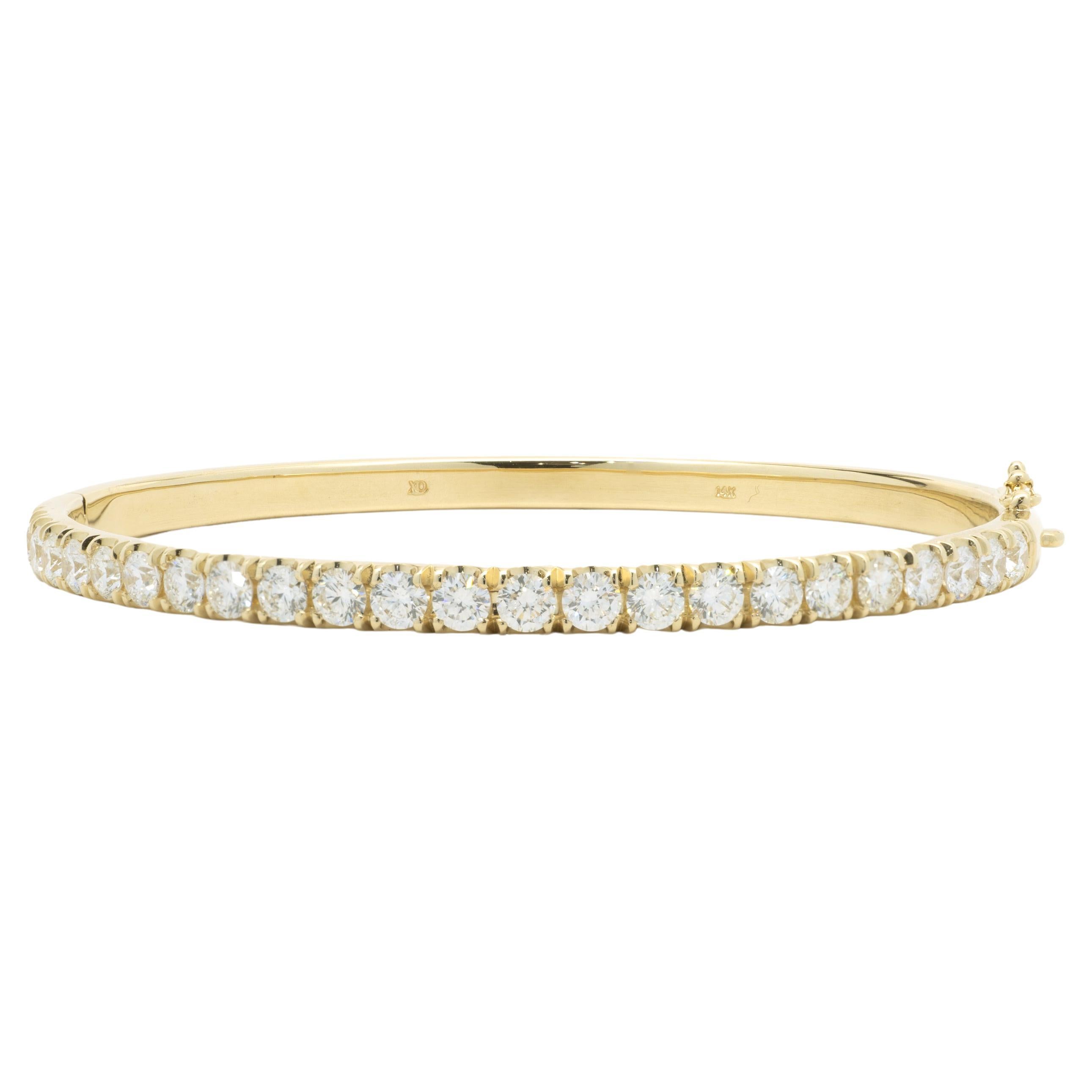 Armreif aus 14 Karat Gelbgold mit Diamanten