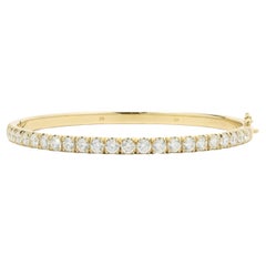 Armreif aus 14 Karat Gelbgold mit Diamanten