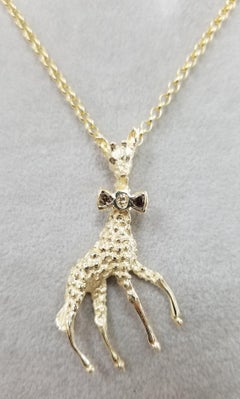 14 Karat Yellow Gold Diamond Bow Tie "Giraffe" Pendant